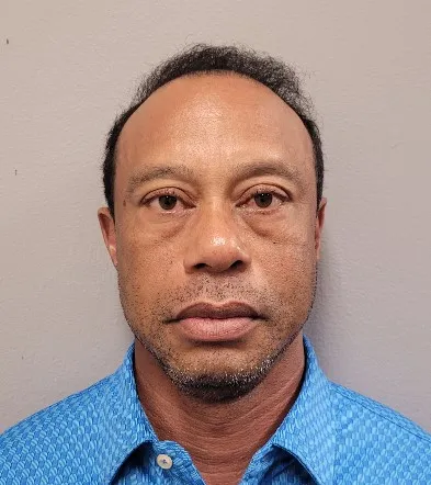 Tiger Woods poses for his booking photo in Stuart, Florida.