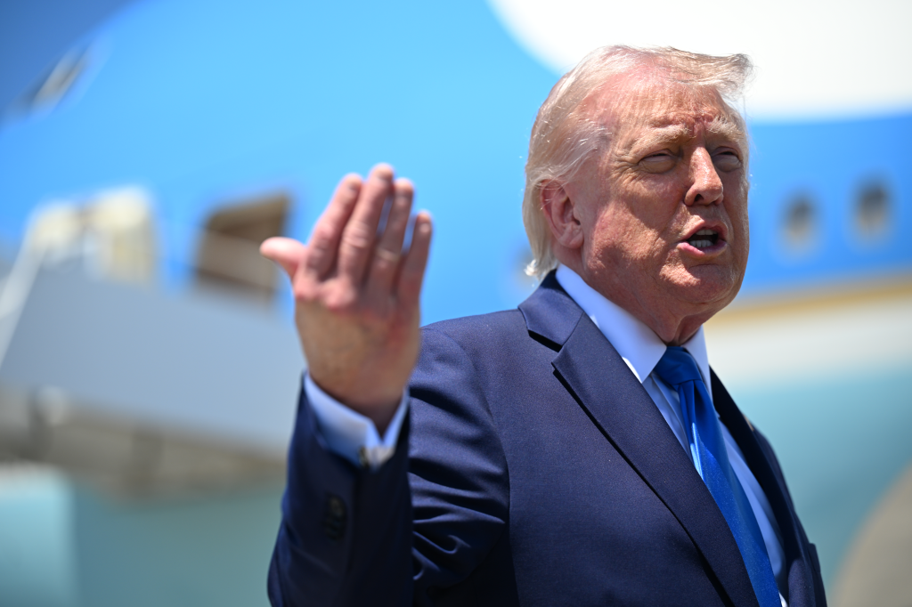 U.S. President Donald Trump speaking to the press in front of Air Force One.