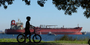 Oil Prices Recede and Stocks Gain as Investors Eye Peace Talks