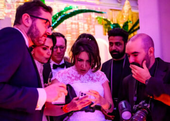 After the Gunfire, the Parties Went On, Uneasily