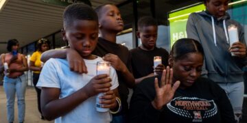 Relatives of mass shooting victims in Louisiana pray for end to domestic violence