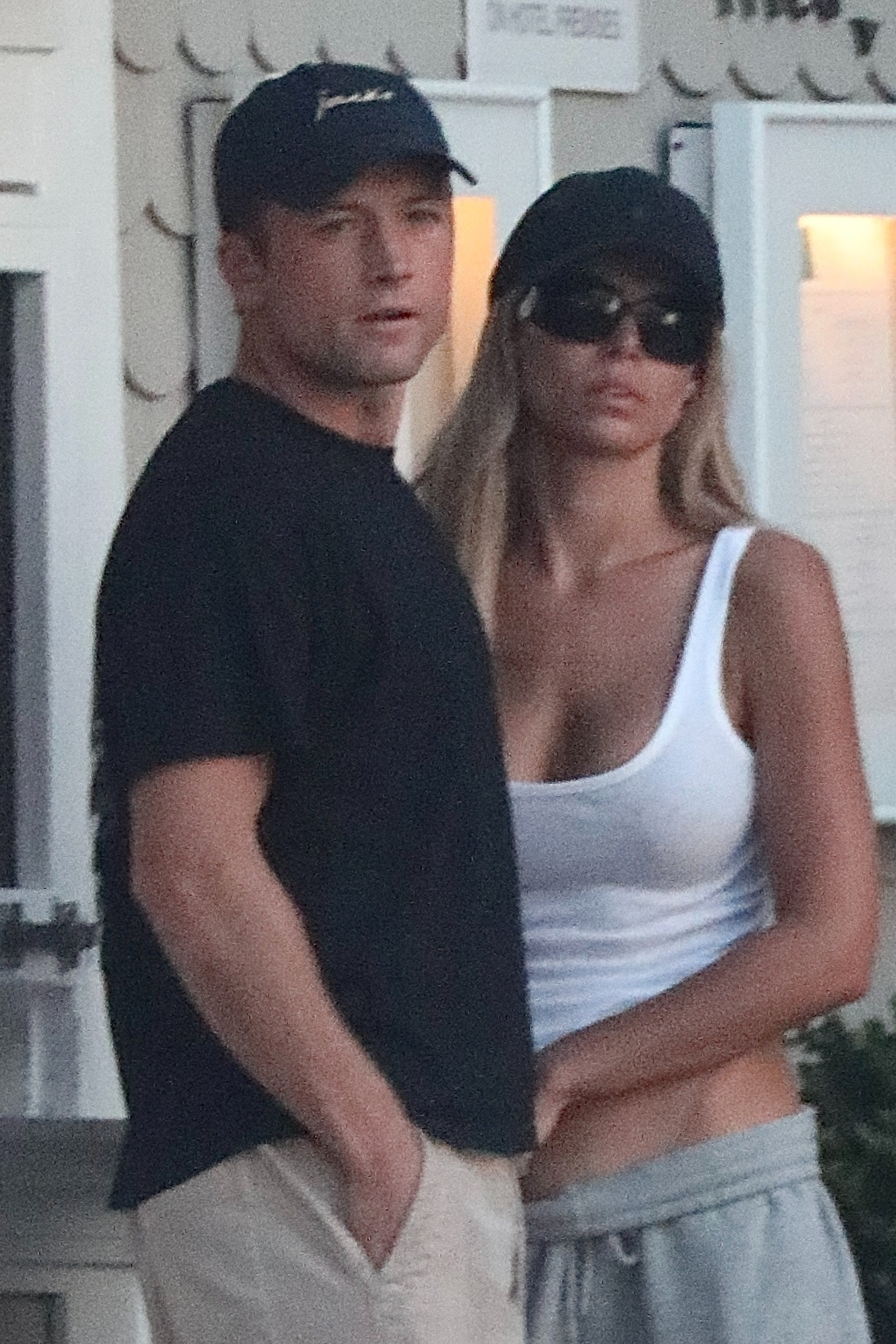 Brooks Nader and Taron Egerton sharing a kiss in Santa Monica.