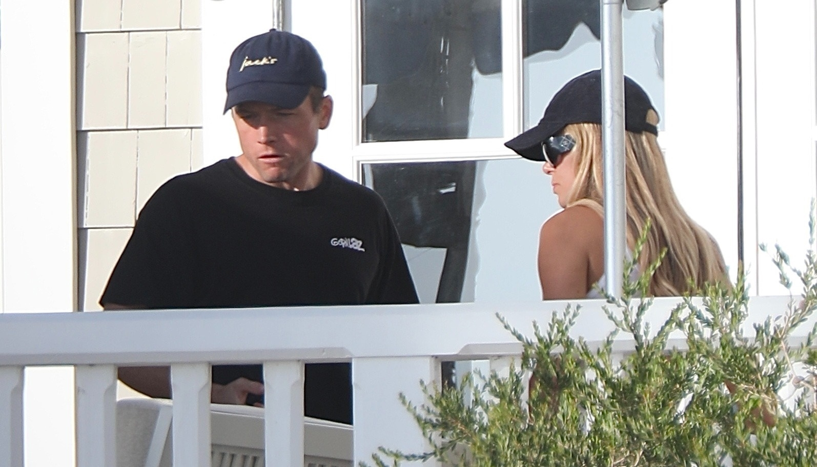 Brooks Nader and Taron Egerton on a porch in Santa Monica.