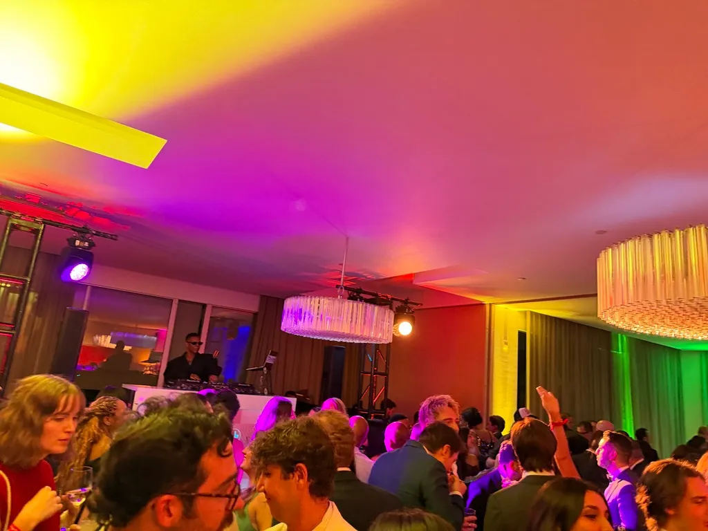 The annual TIME party after the White House Correspondents' Dinner, with a DJ and colorful lighting.