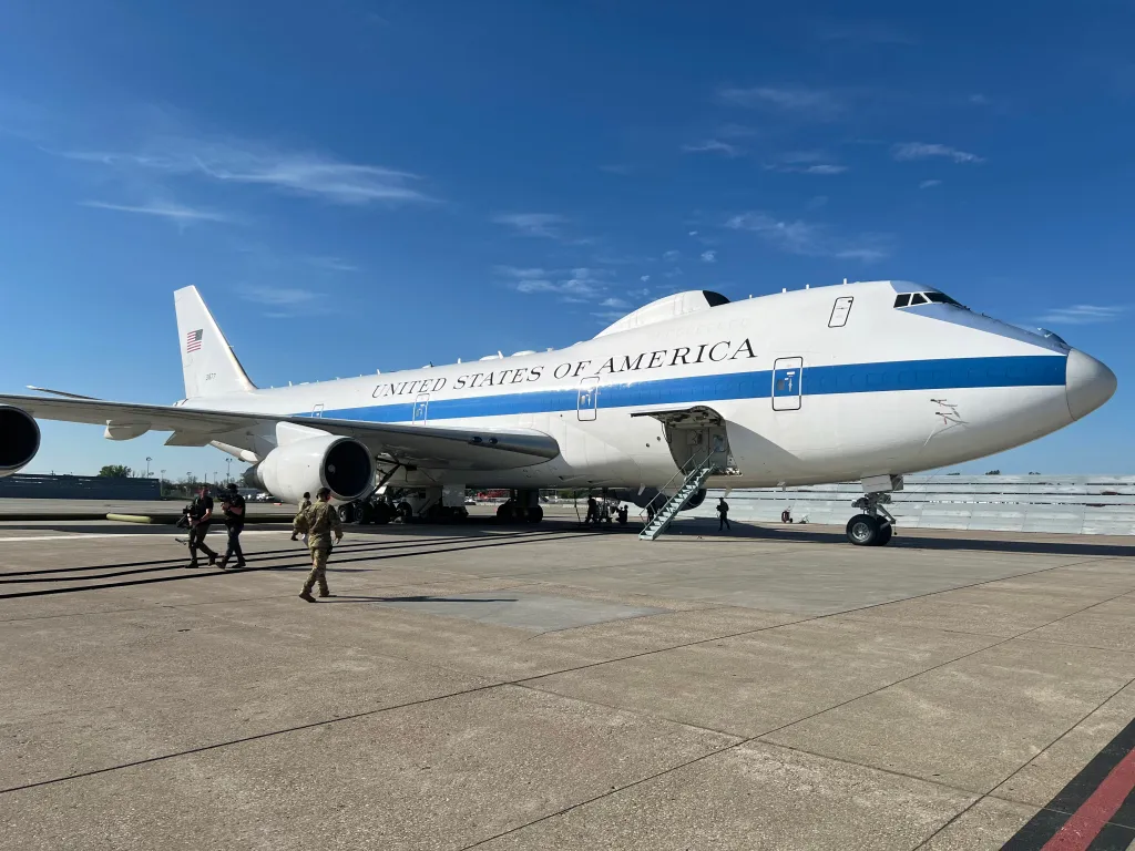 595th Aircraft Maintenance Squadron maintainers prepare the E-4B for flight as a visiting documentary production team loads onto the Nightwatch to film a local training sortie and air refueling mission from Offutt Air Force Base, Neb., May 15, 2024.