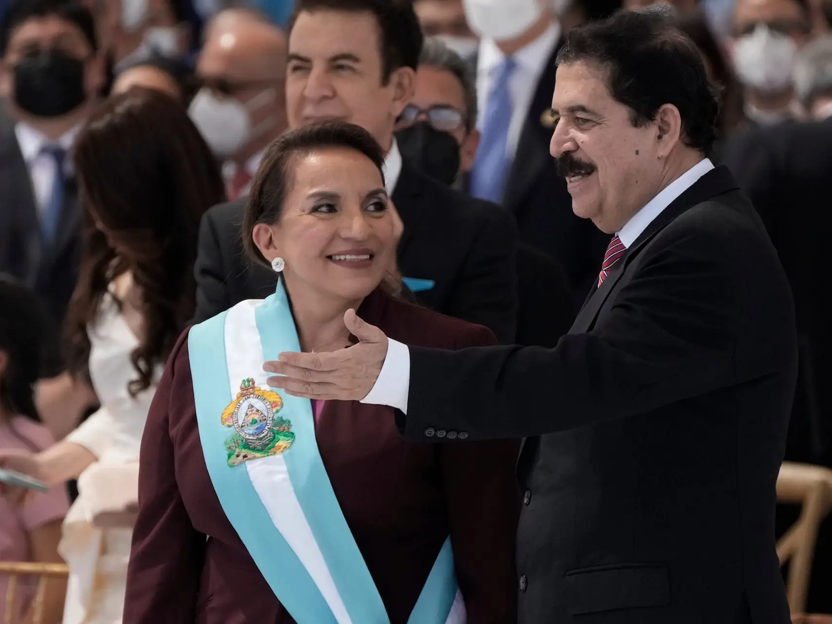 President Xiomara Castro smiles after receiving the presidential sash.