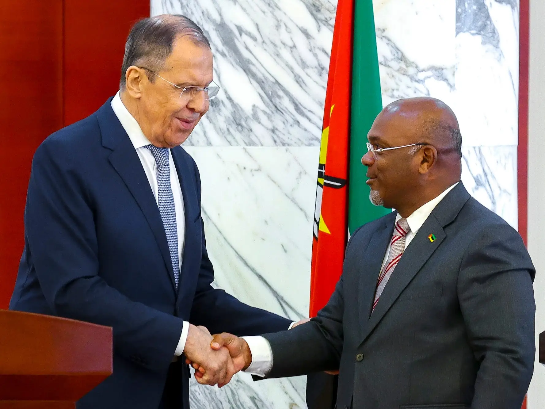 Russian Foreign Minister Sergey Lavrov, left, and Minister of Public Works, Housing and Water Resources of Mozambique Carlos Alberto Fortes Mesquita shake hands in 2023. Lavrov, at 6 foot 2, is taller than Mesquita.
