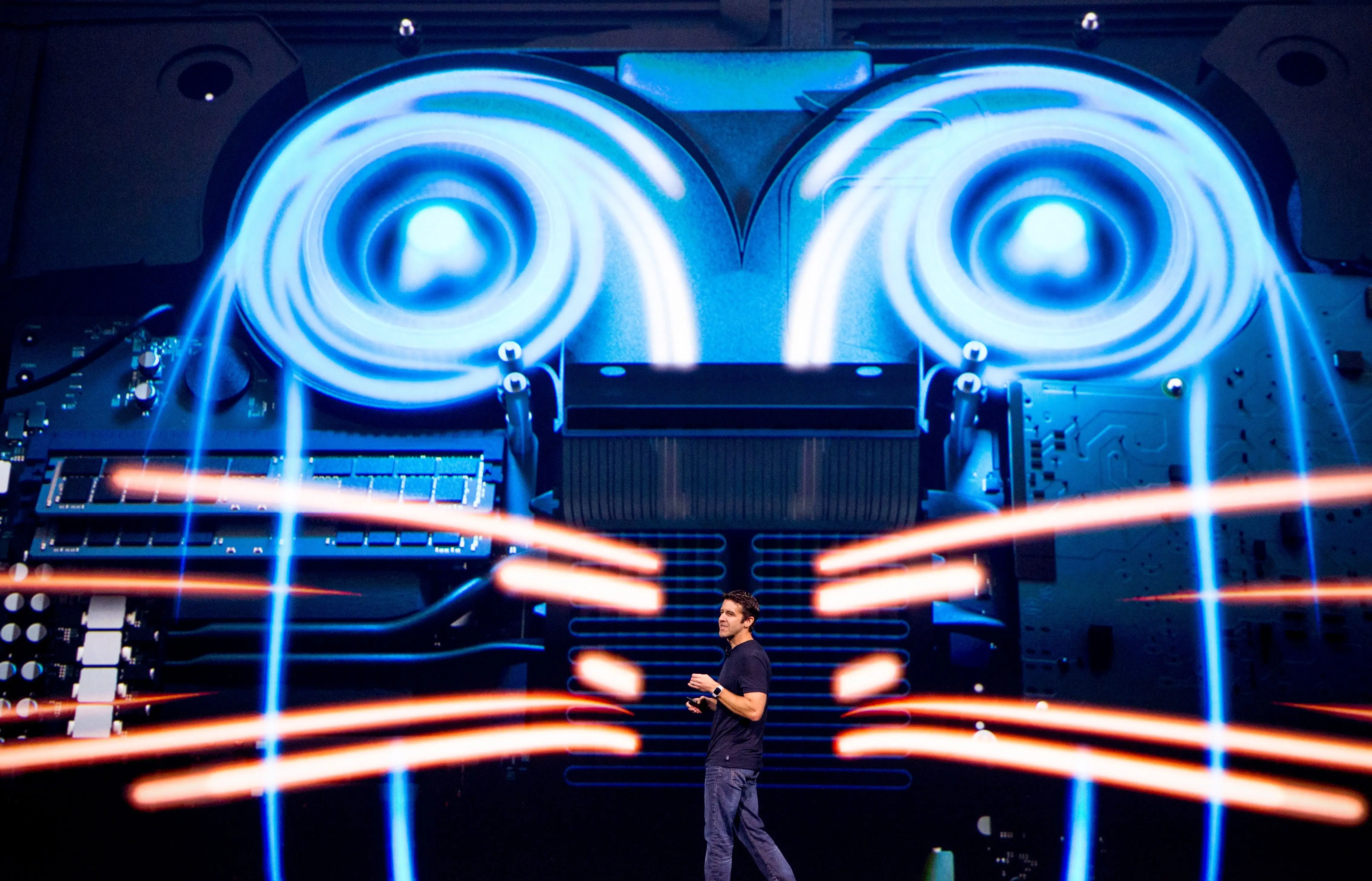 John Ternus speaks on stage at Apple's WWDC conference in San Jose, California in June 2017.