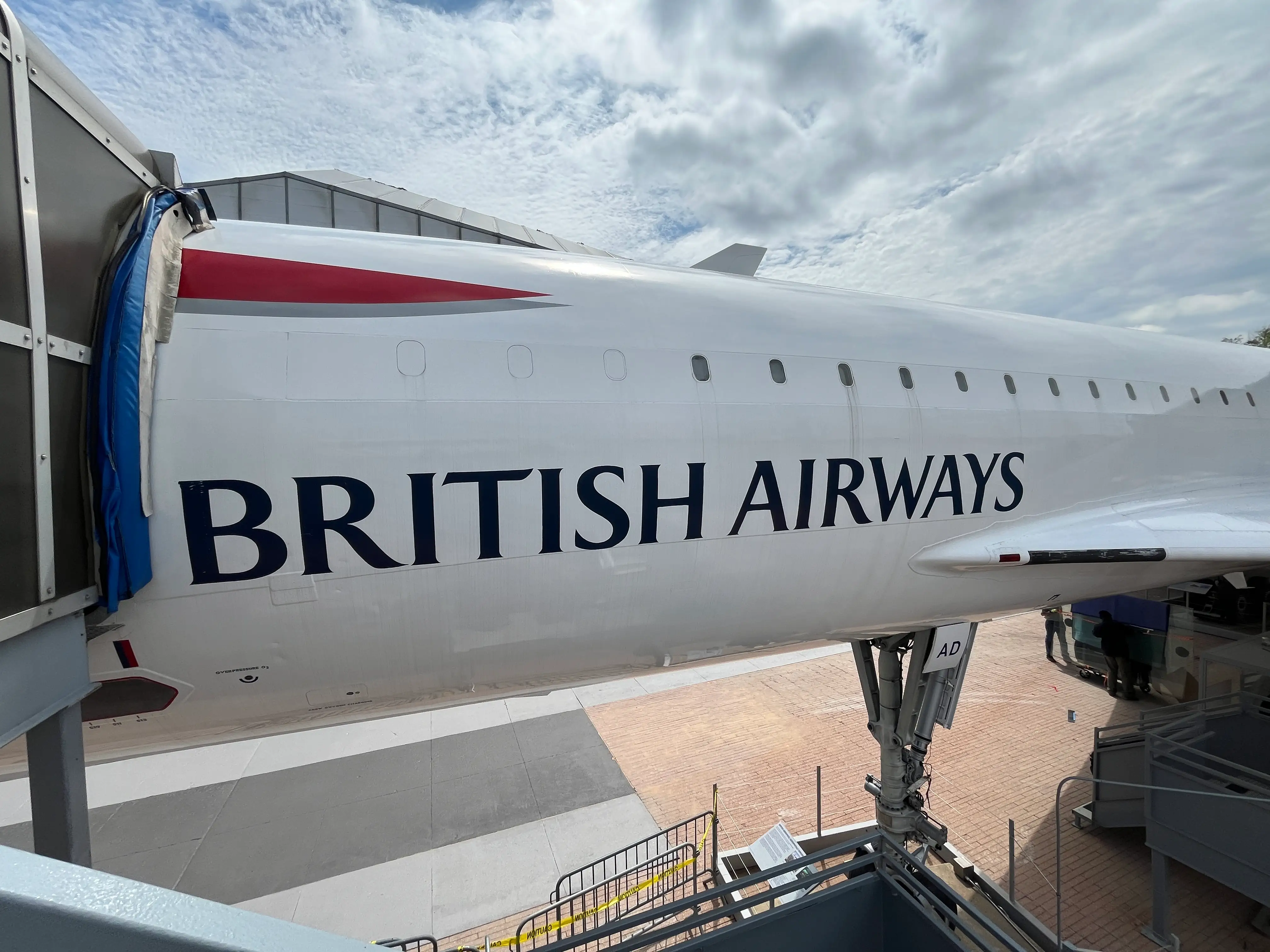 A British Airways logo on the side of a Concorde plane.