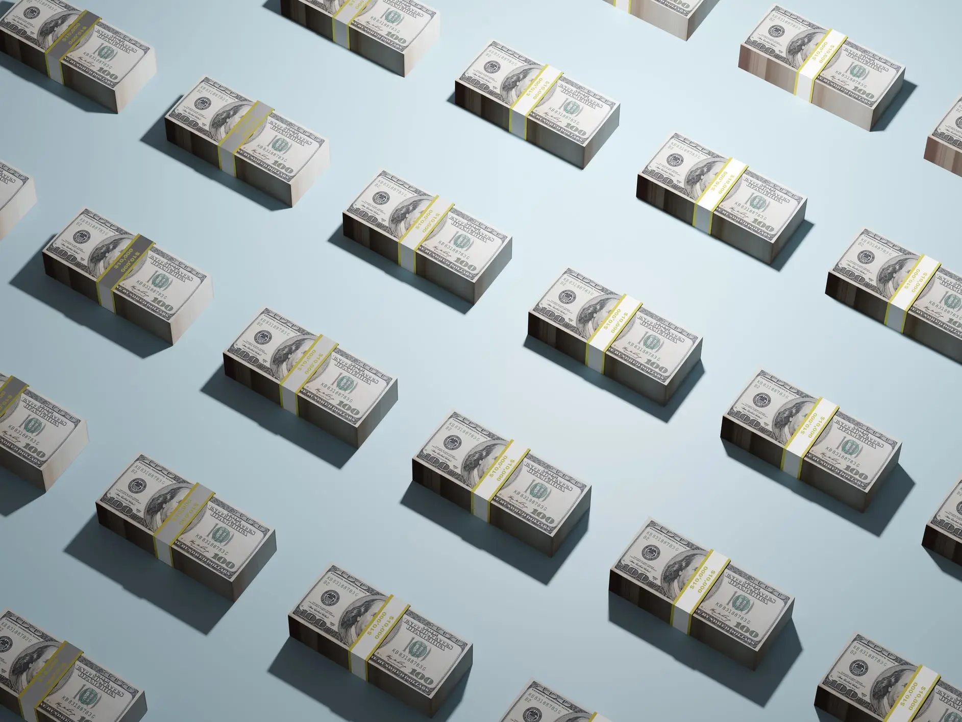 a blue background with stacks of $100 bills