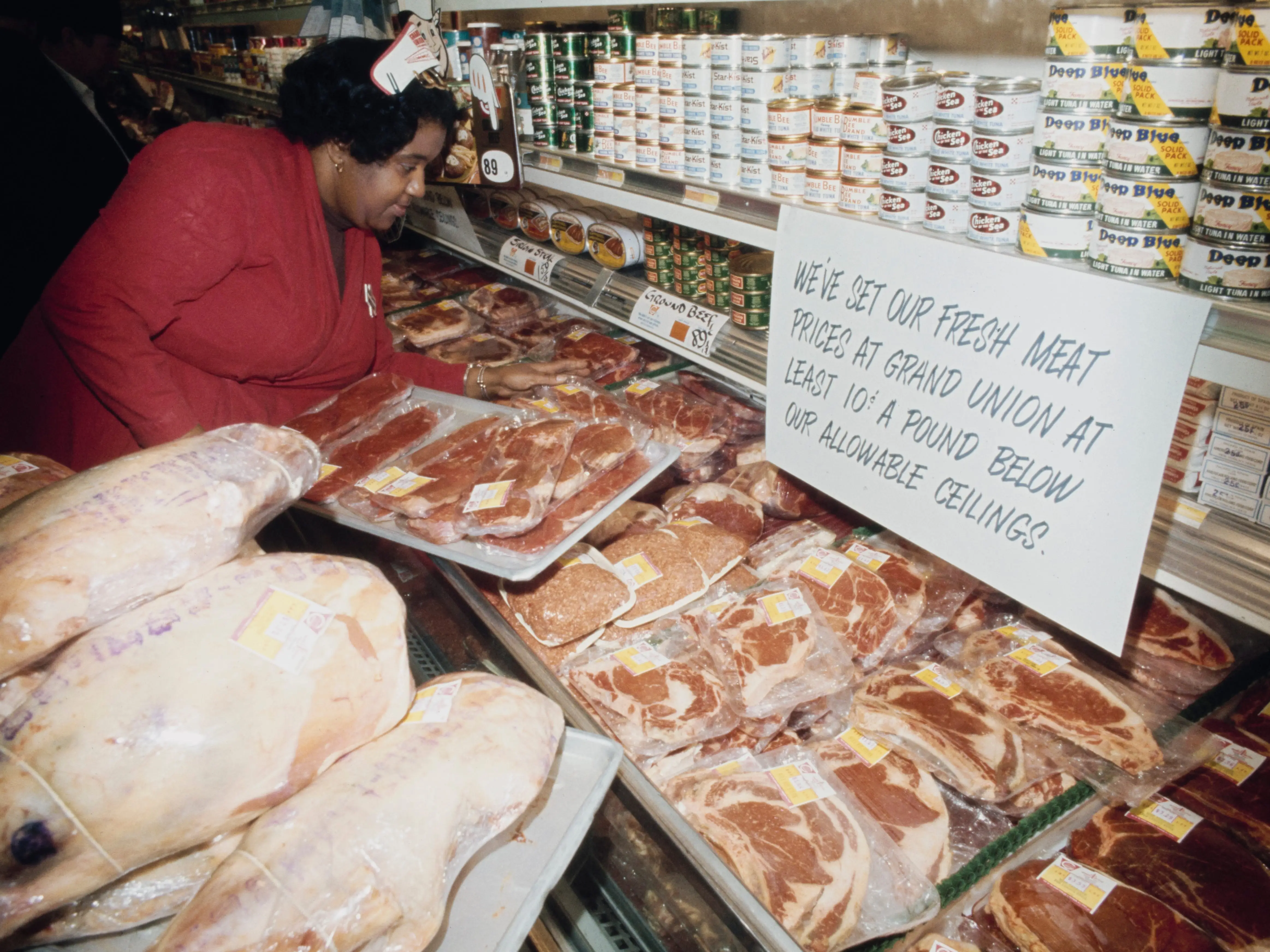 Louise Redd, a Grand Union worker in West Side Manhattan, restocked meat next to a sign that read, 