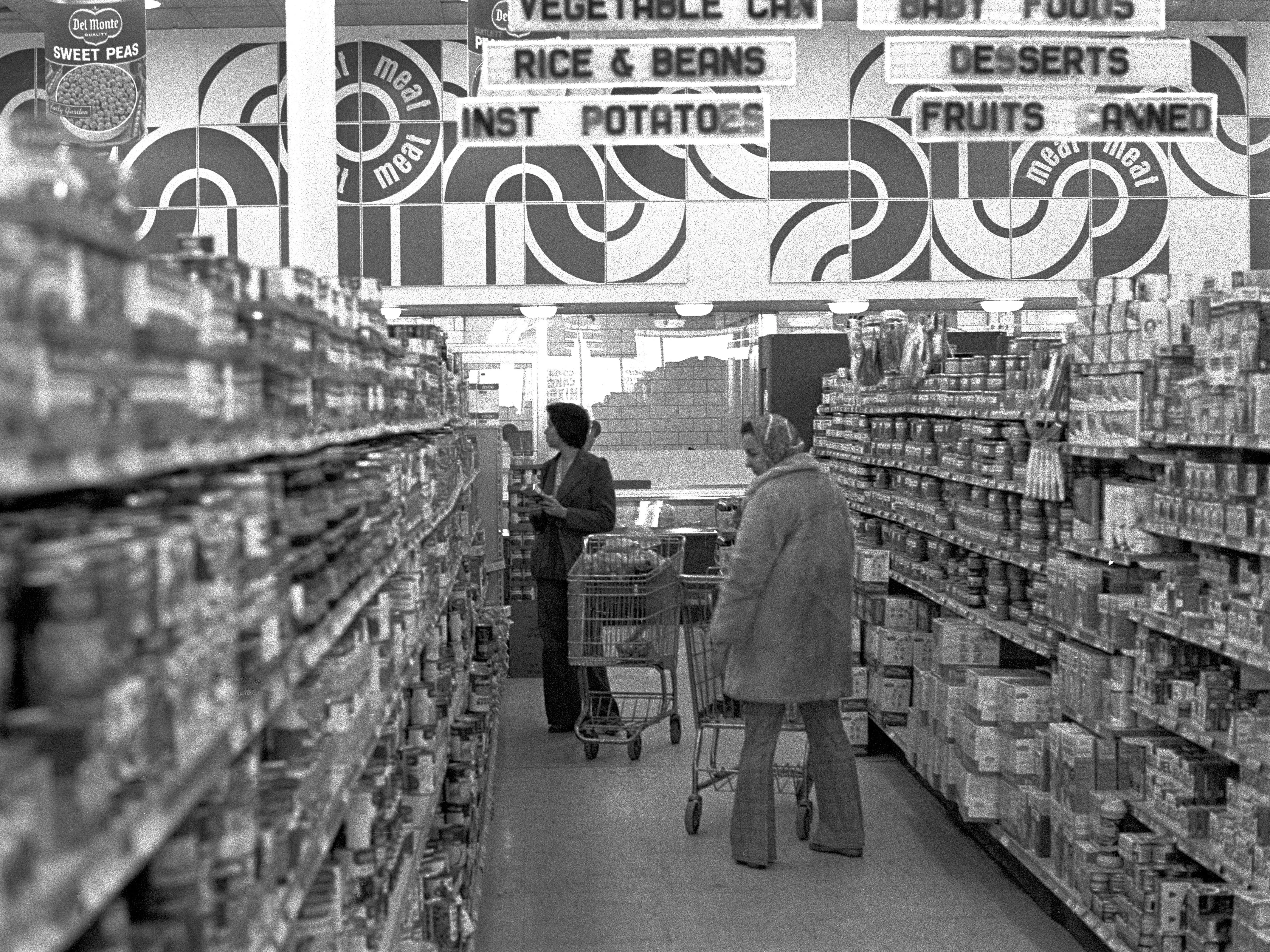 Two women grocery shopping in 1978 in Maryland.