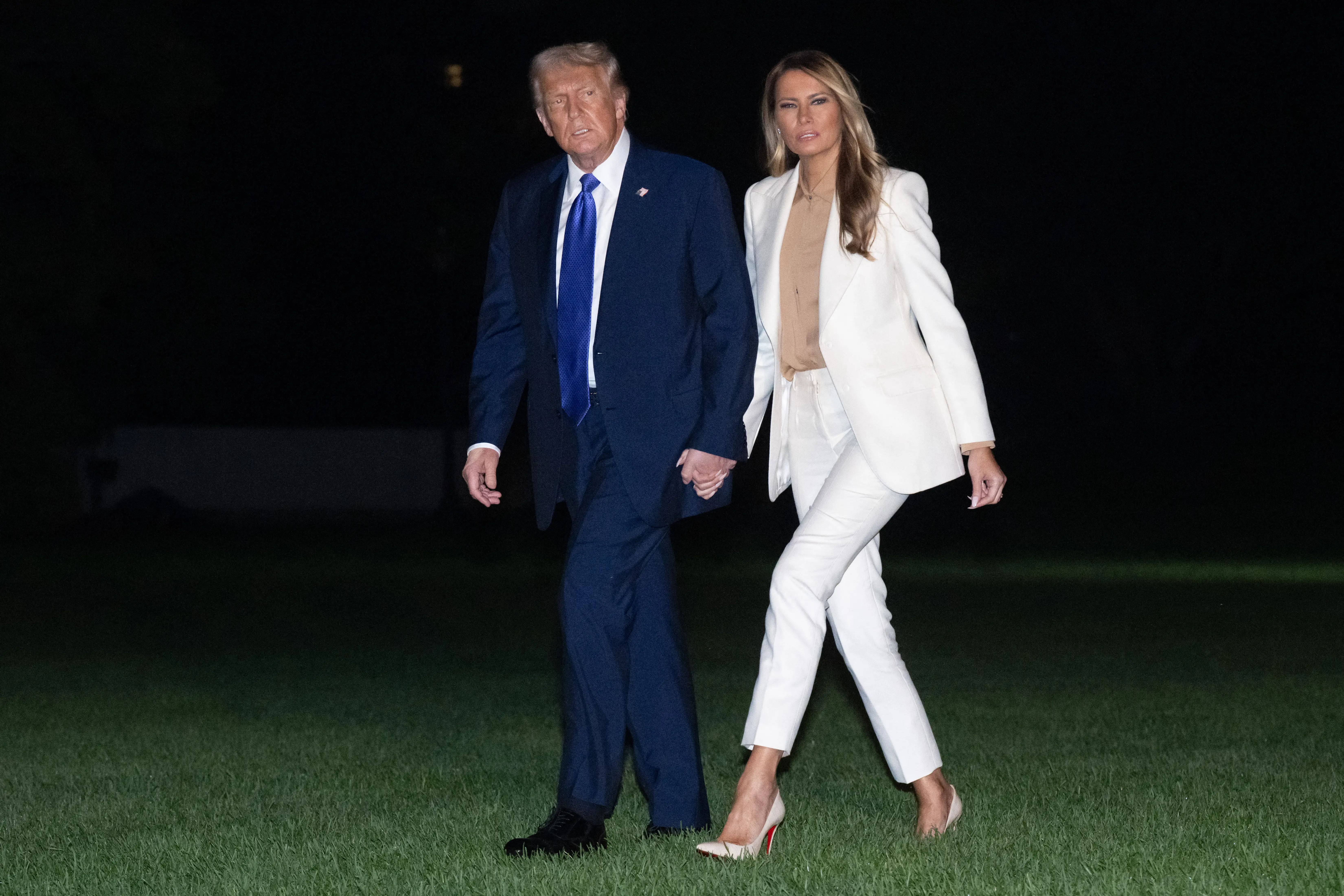 Donald Trump and Melania Trump arrive at the White House in September 2025.