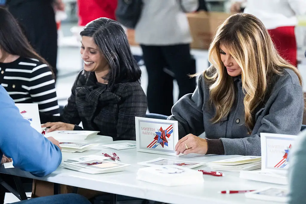 Usha Vance and Melania Trump write notes for care packages for deployed service members.