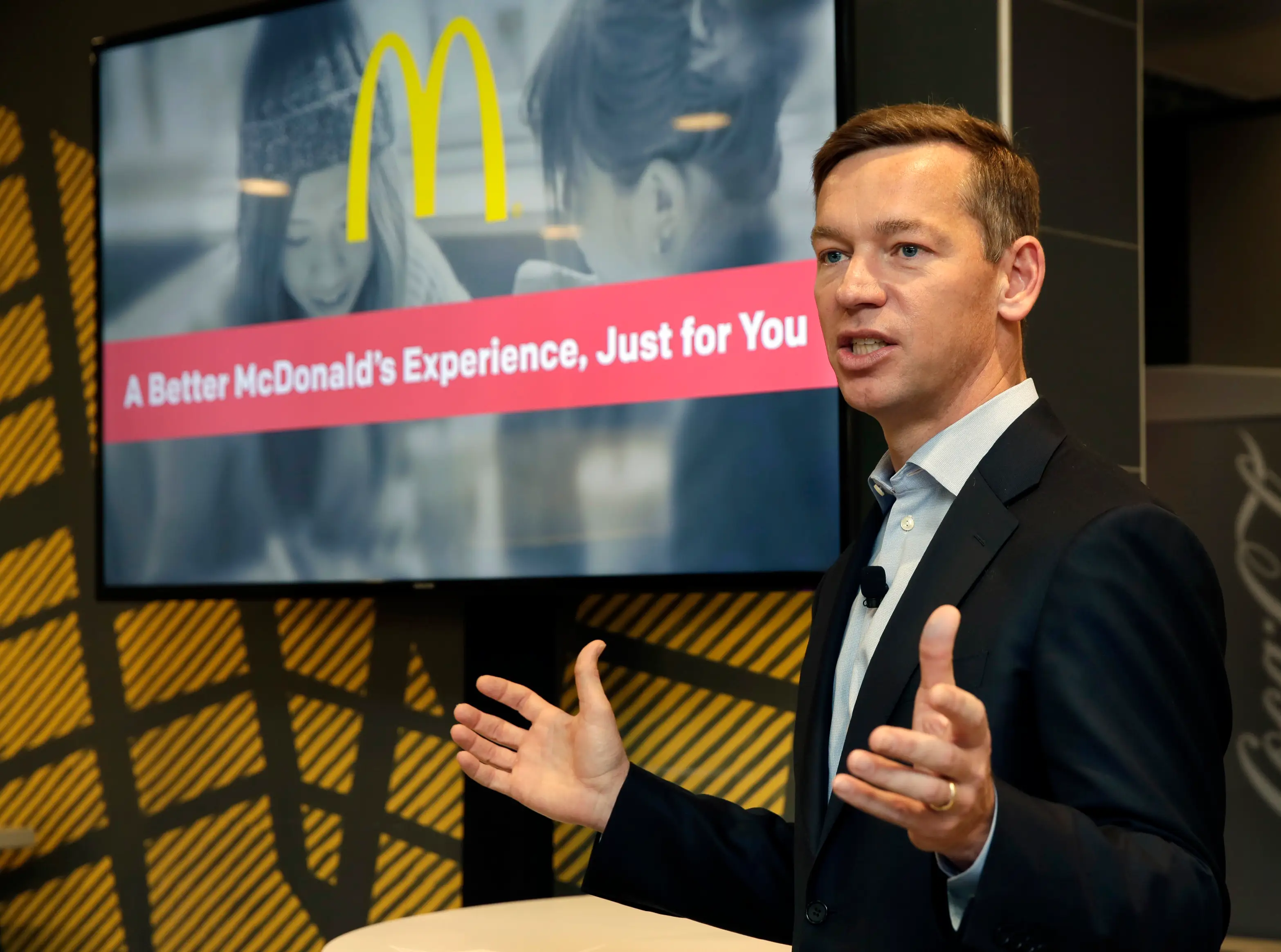 McDonald's CEO Chris Kempczinski at a podium