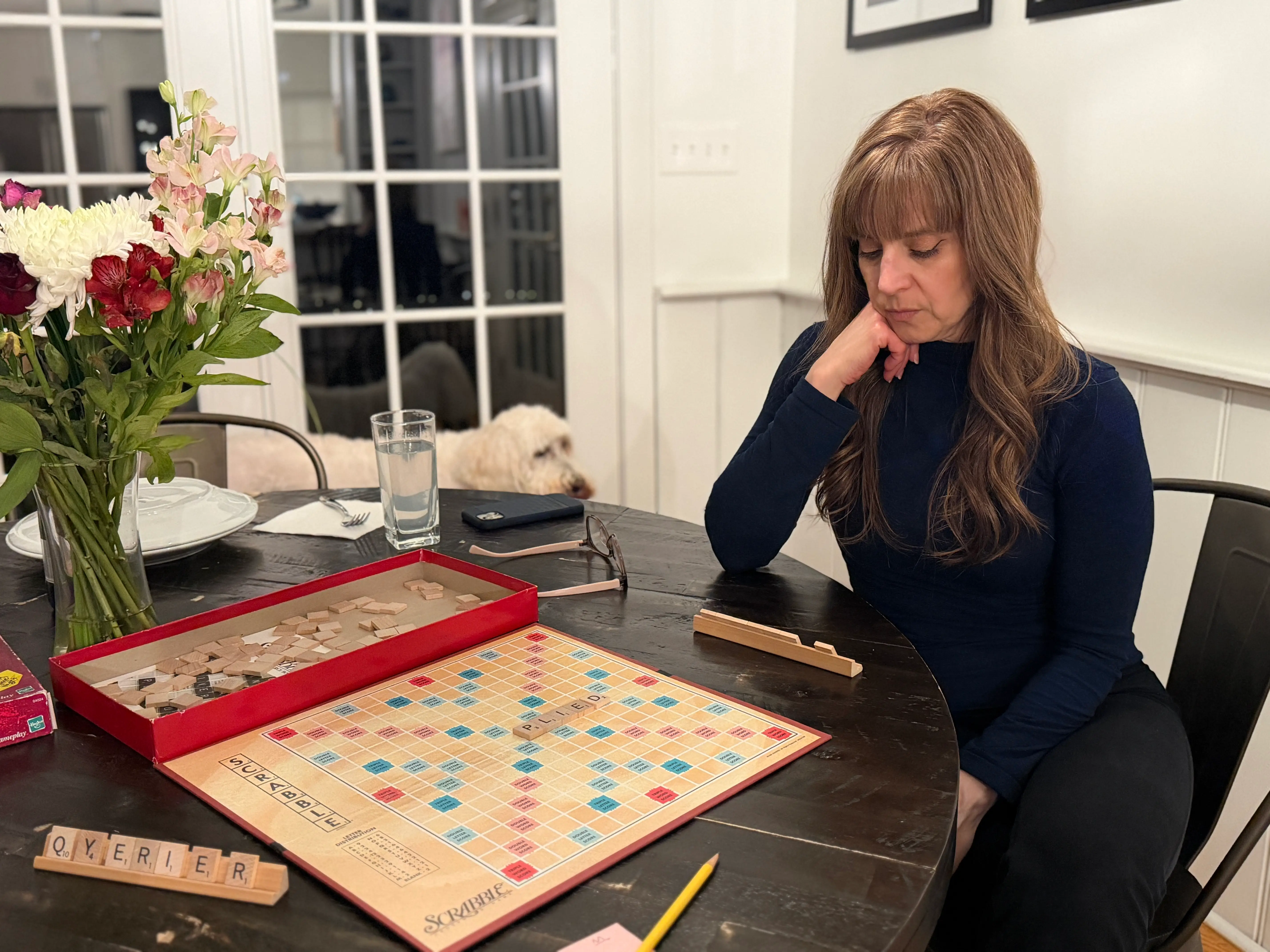 woman playing scrabble
