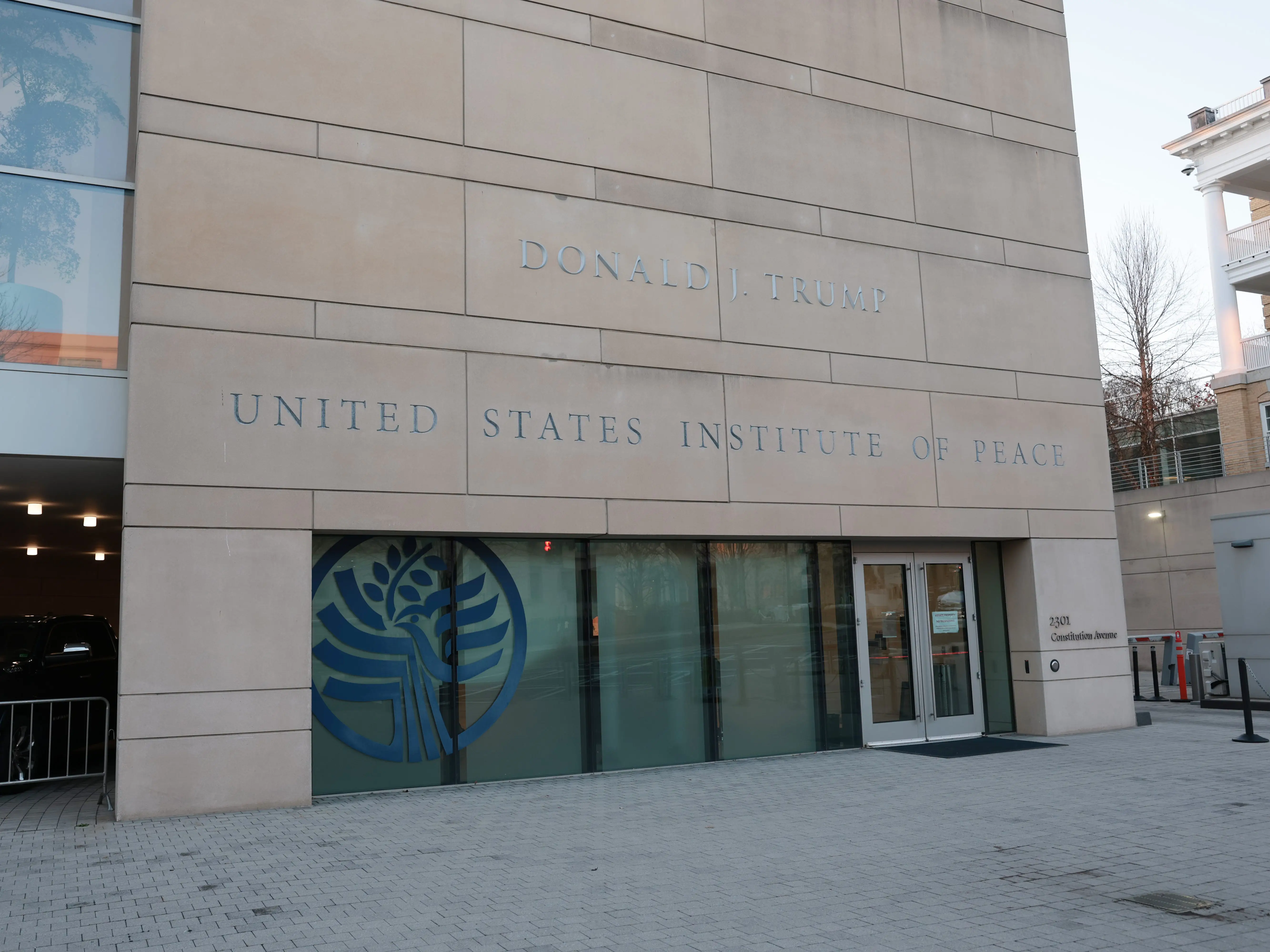 U.S. President Donald Trump's name is seen recently placed on the outside of the United States Institute of Peace (USIP) building headquarters