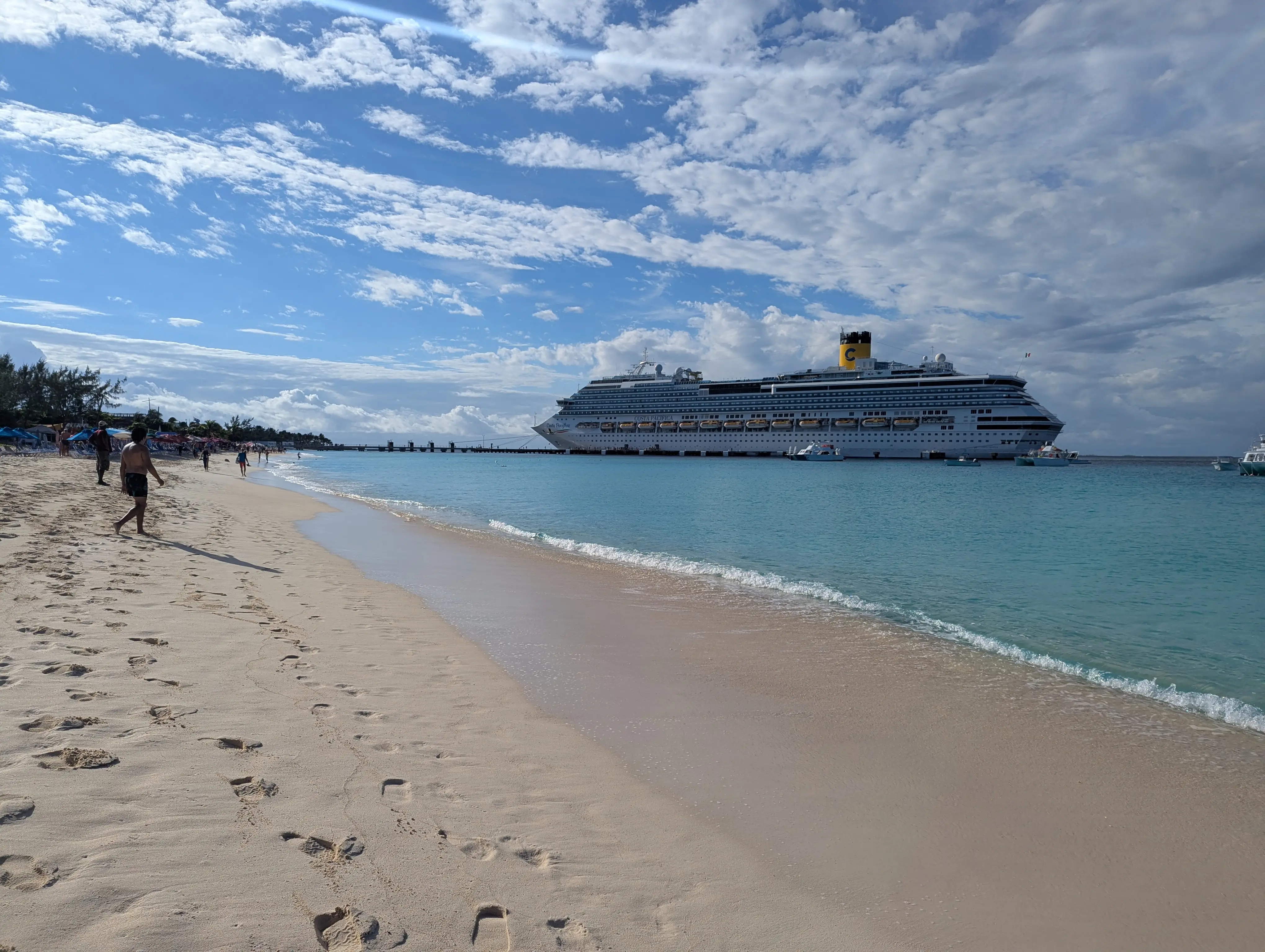Beach with cruise ship in the distance