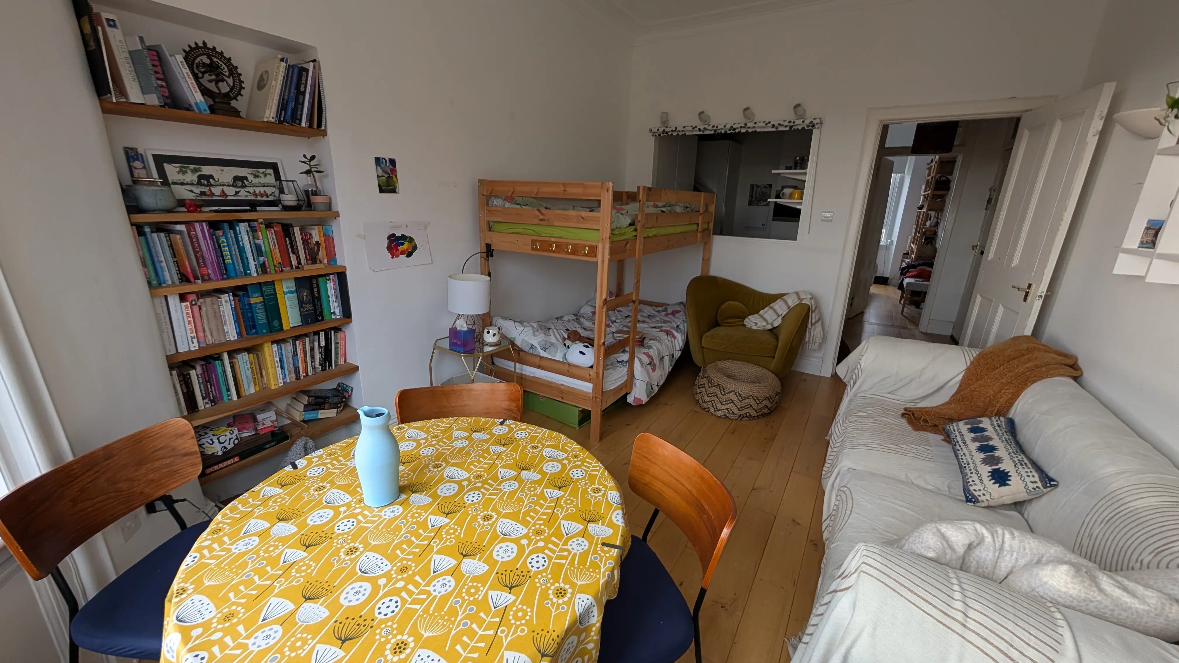 Bunk beds in living room near couch