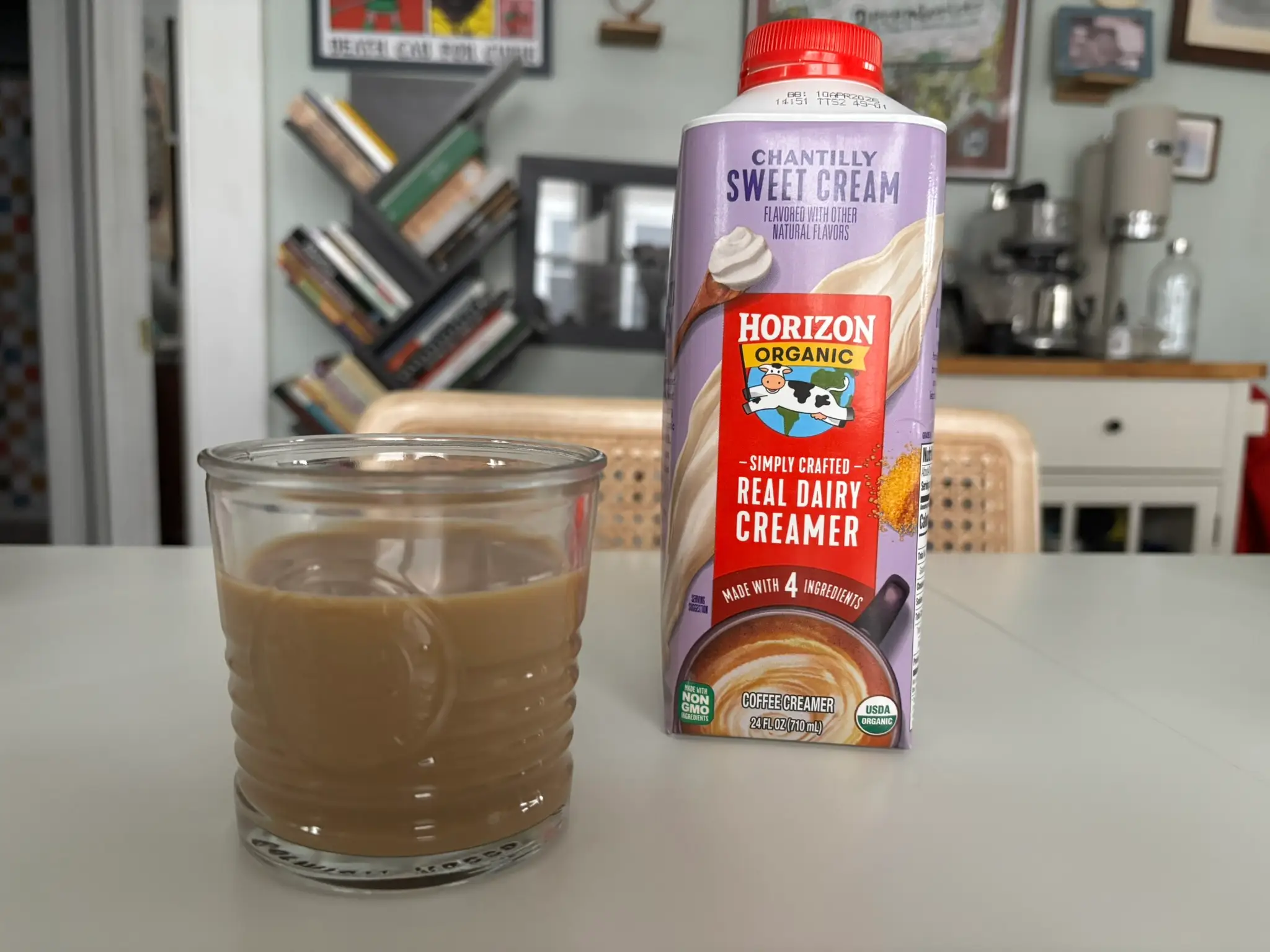 Horizon Sweet cream creamer next to cup of coffee with cream in it