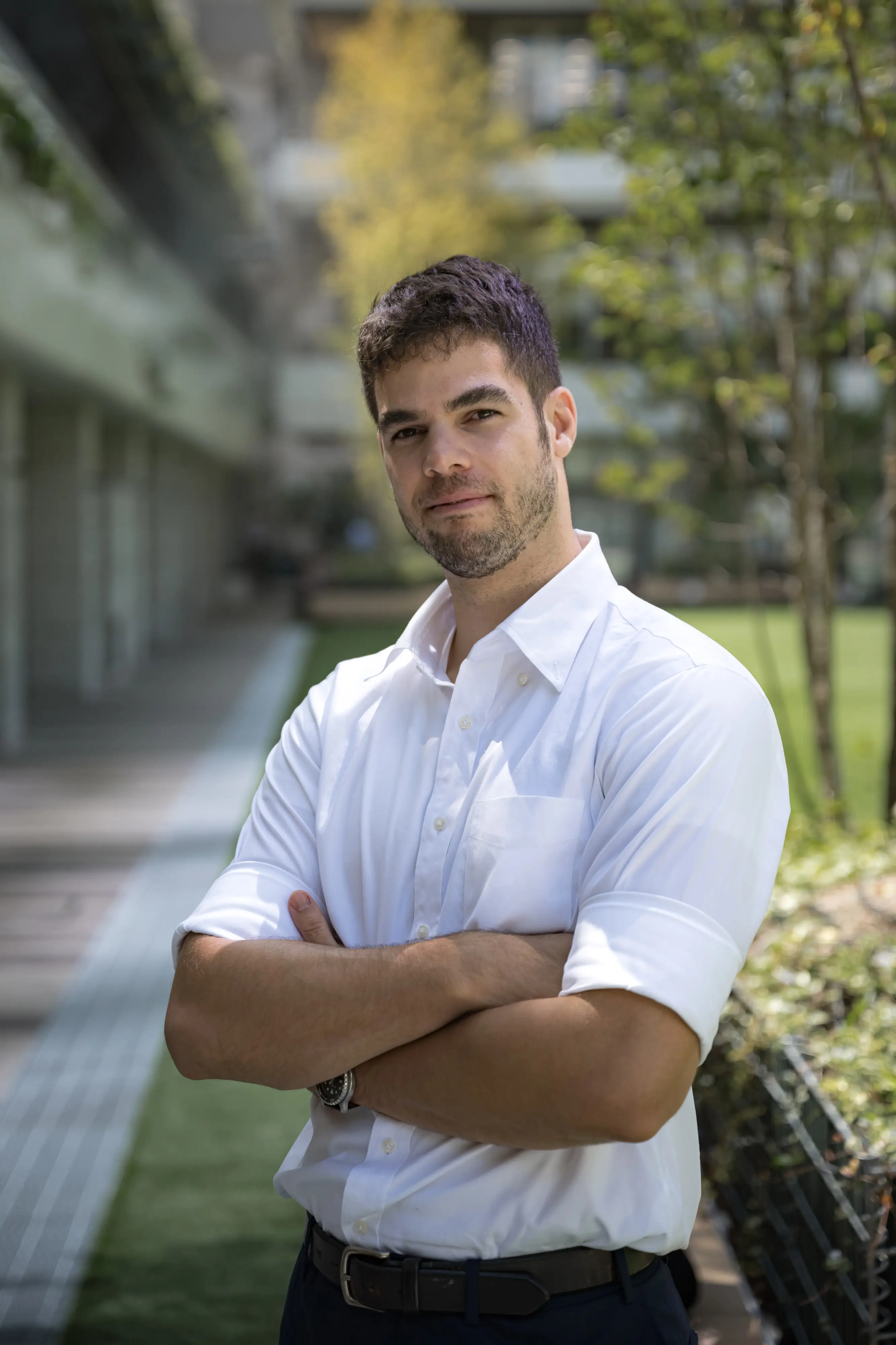 A man in rolled up sleeves in Japan.