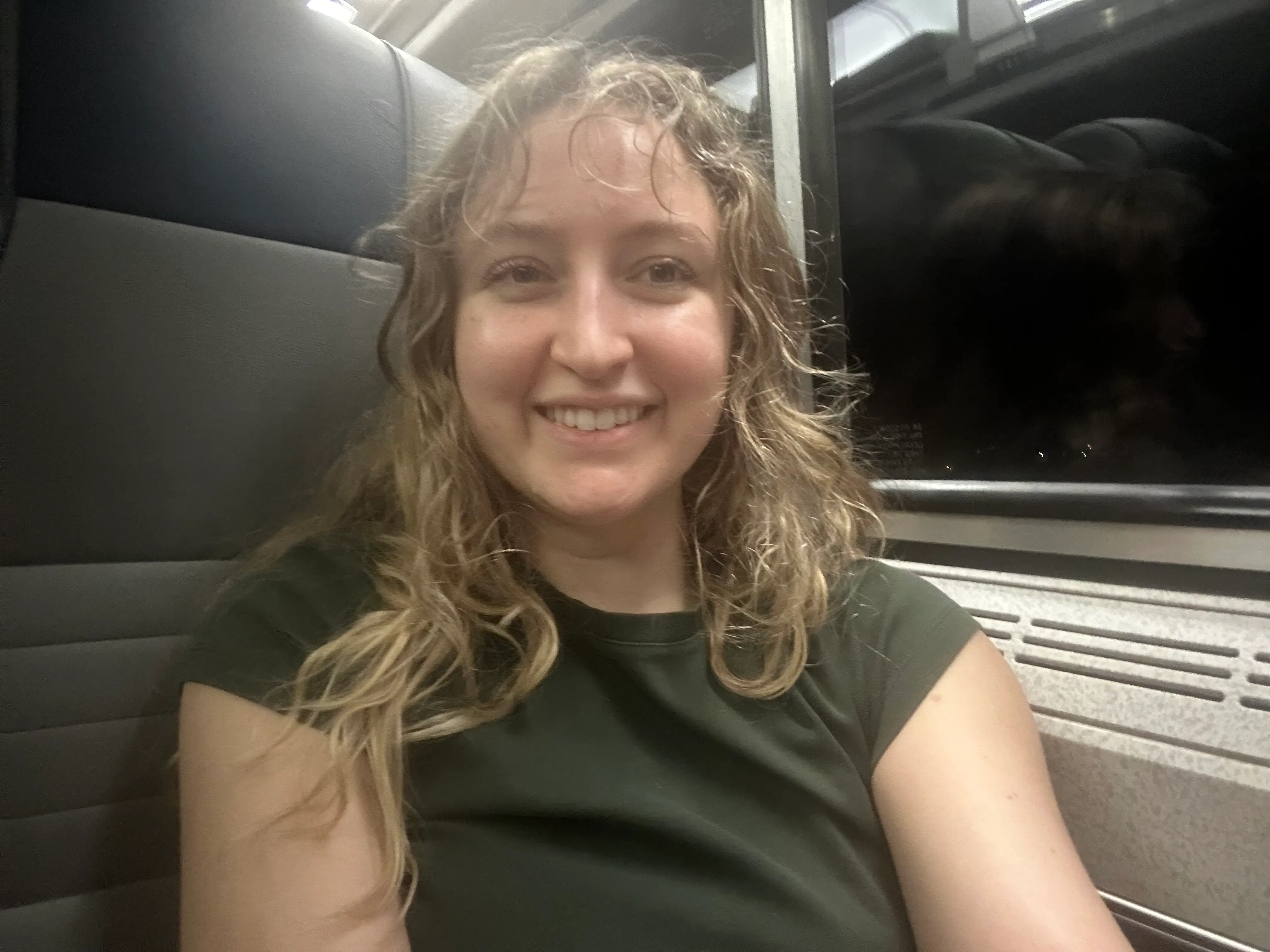 Woman smiling on Amtrak train