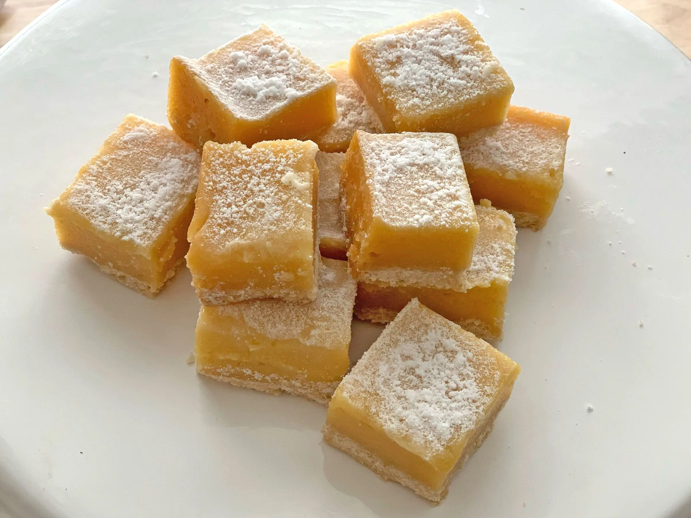 Trader Joe's lemon bars on a white plate.