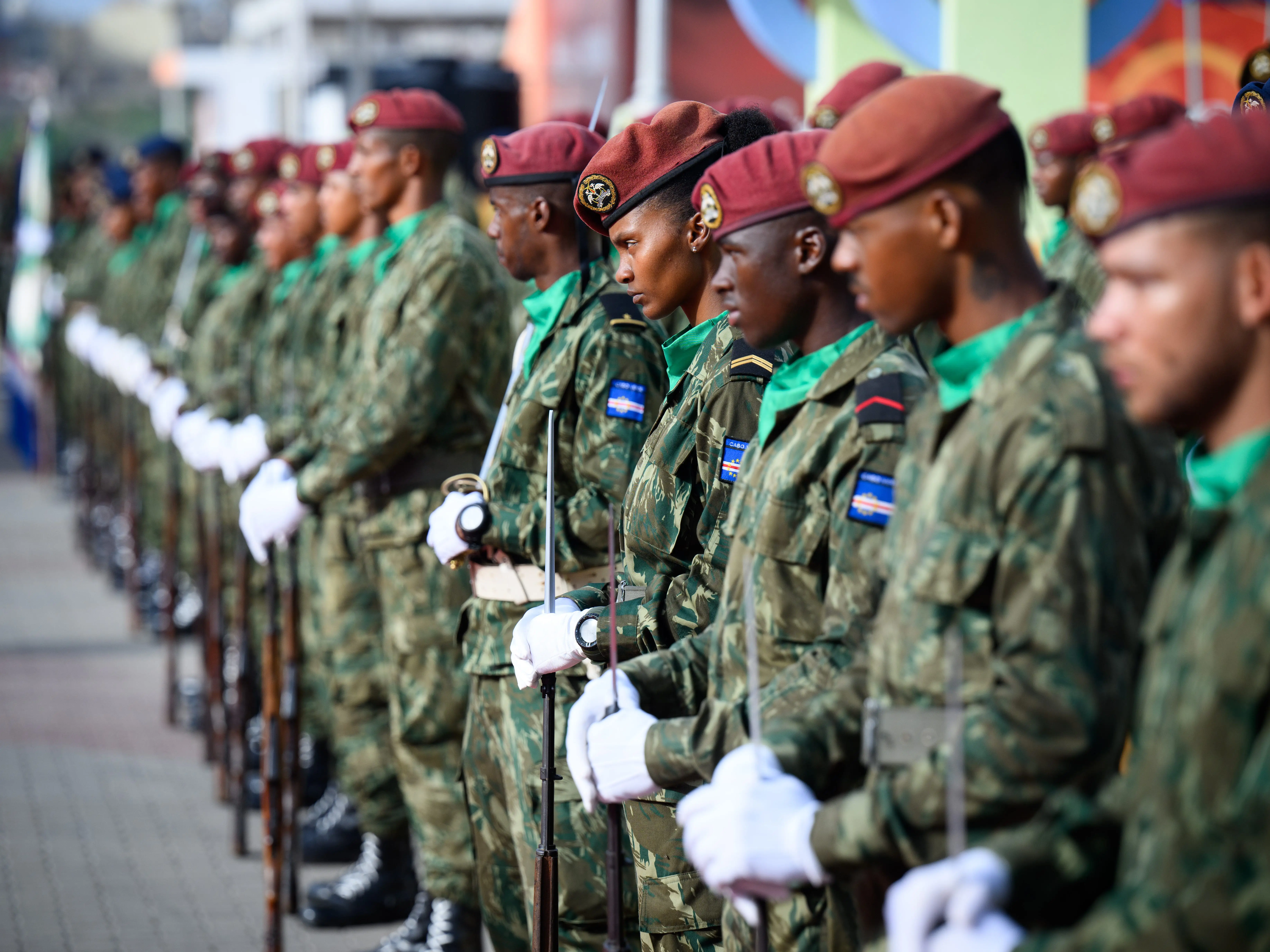 Soldiers of the Presidential Honor Guard of Cabo Verde stand in a line.