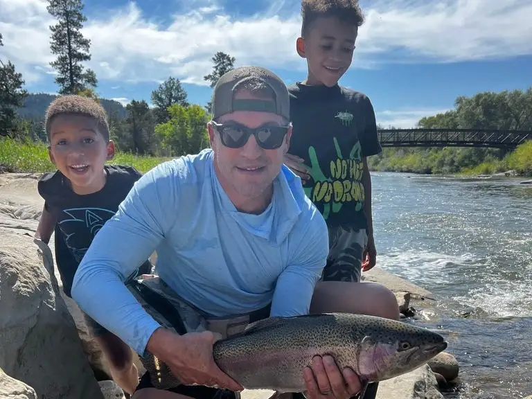Dad and kids fishing