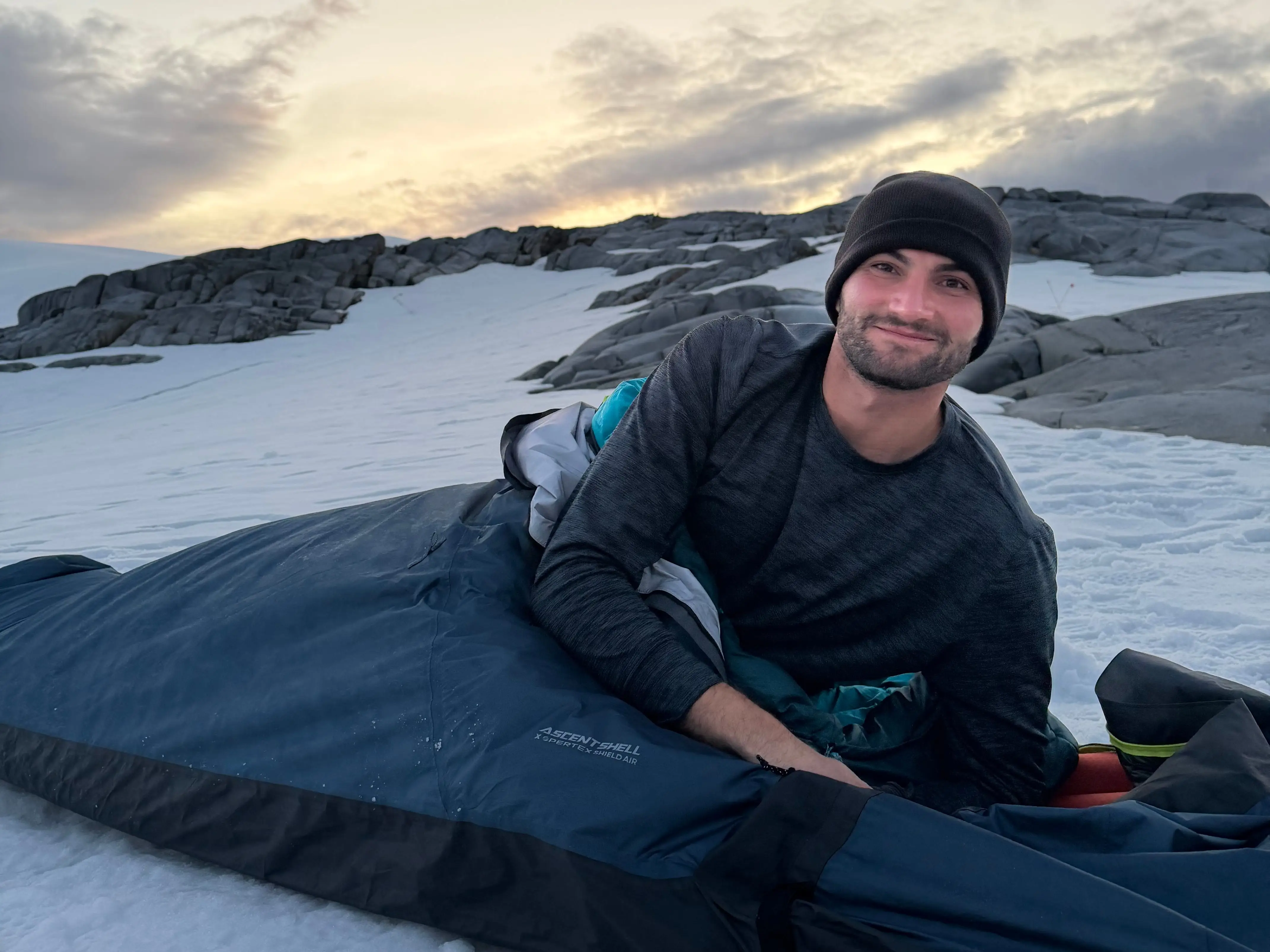 A man camping in Antarctica.