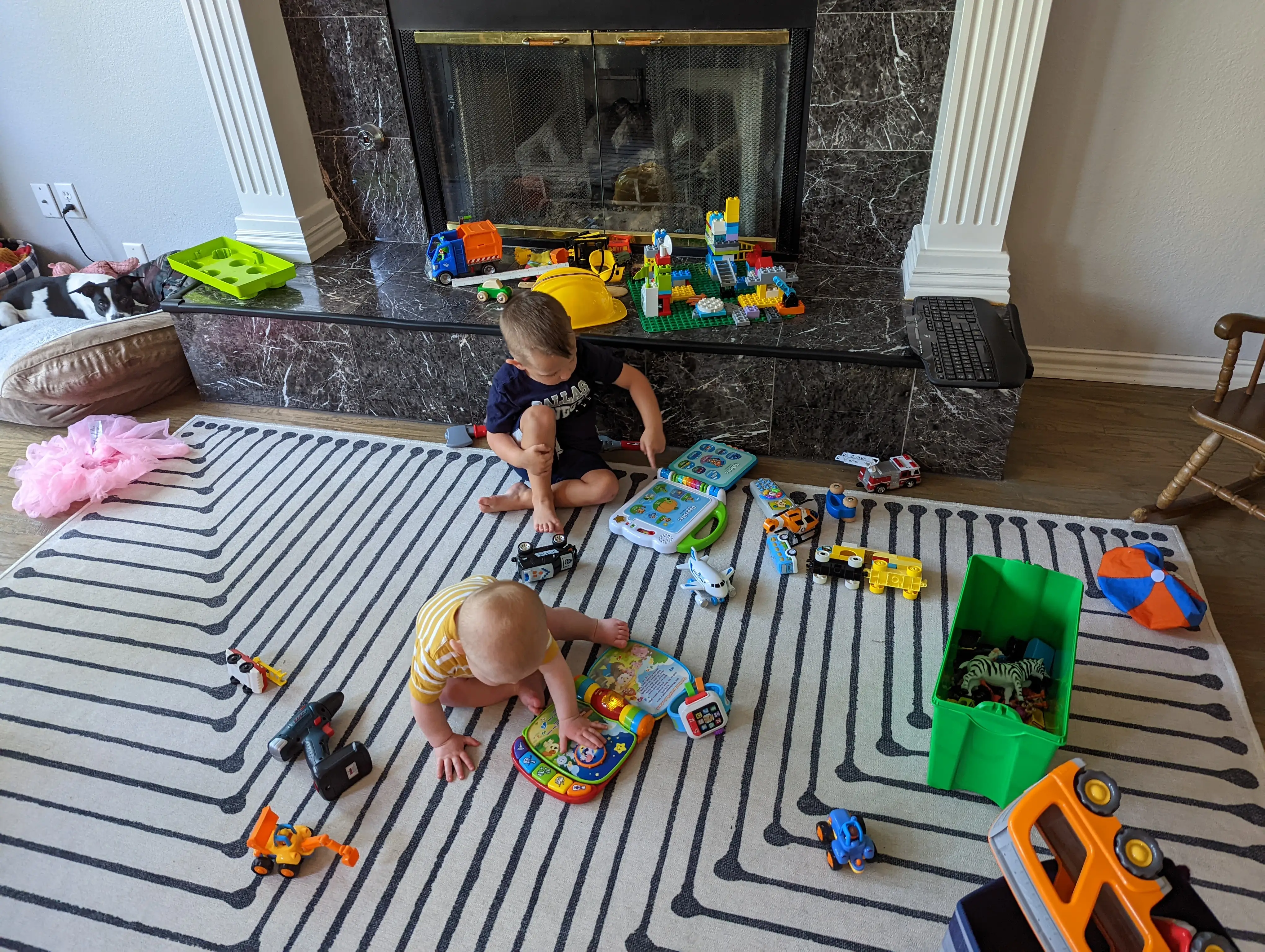 Two kids playing in living room