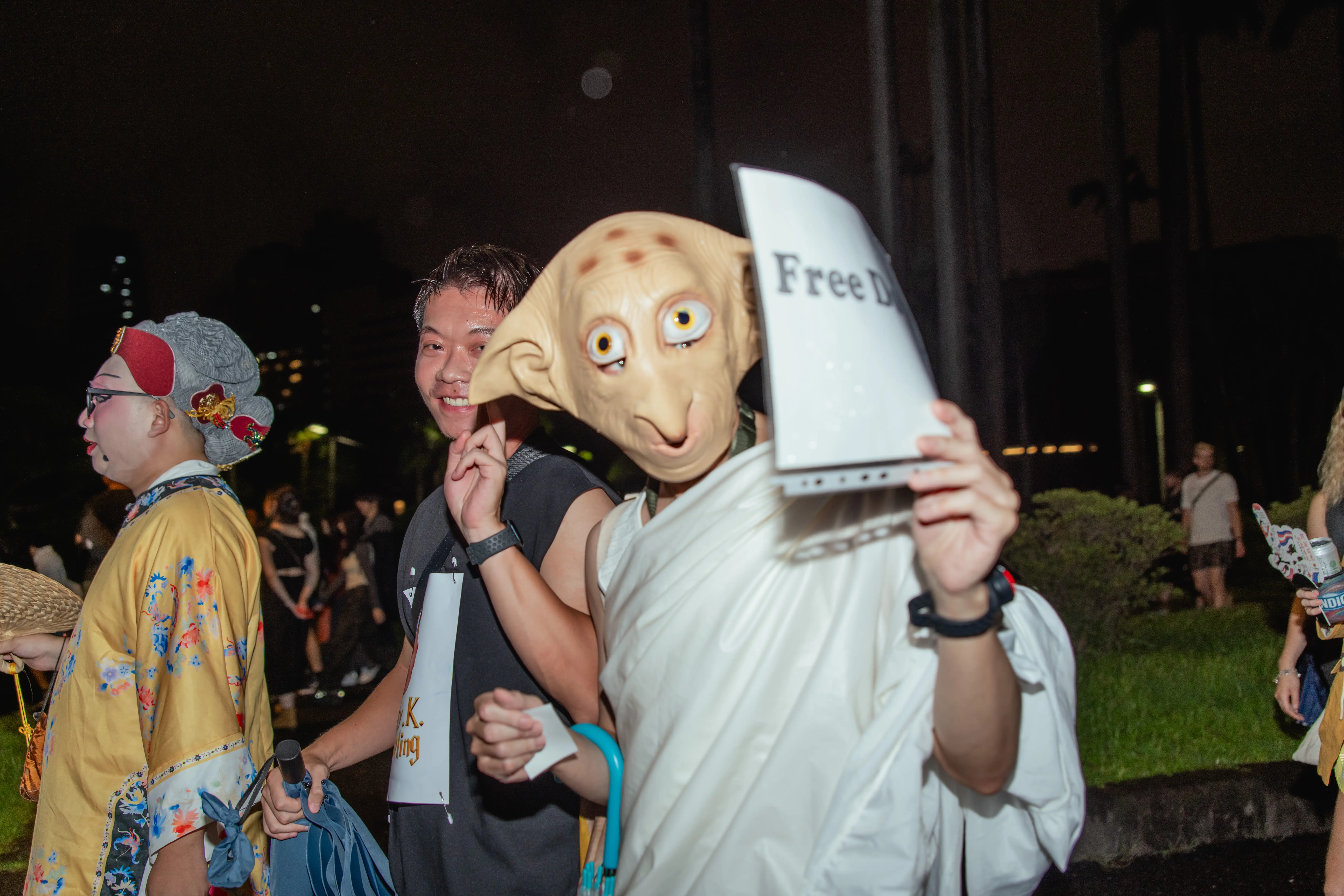 TAIPEI, TAIWAN - OCTOBER 24: Participants playing Dobby in Harry Potter series in the Trans March on October 24, 2025 in Taipei, Taiwan.