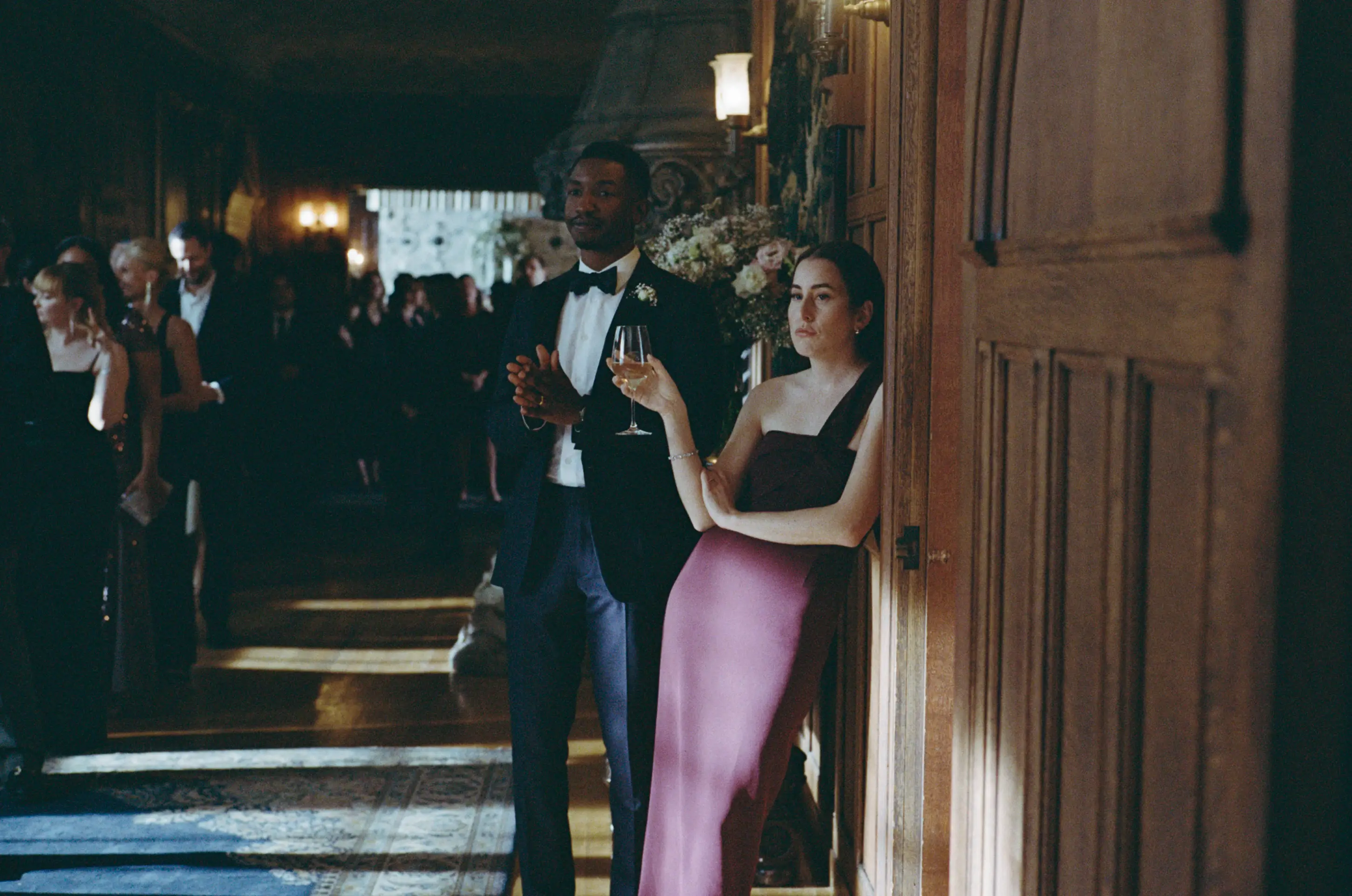 Mamoudou Athie and Alana Haim as Mike and Rachel in 