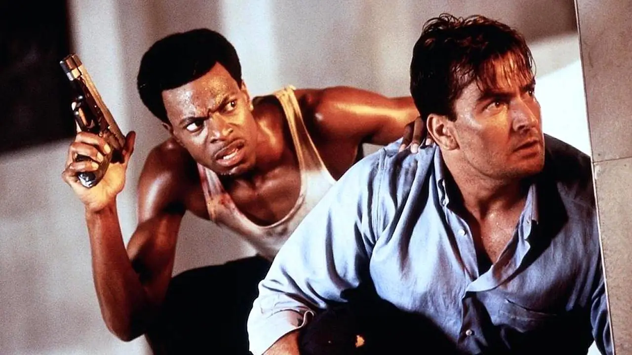 Chris Tucker next to Charlie Sheen in Money Talks