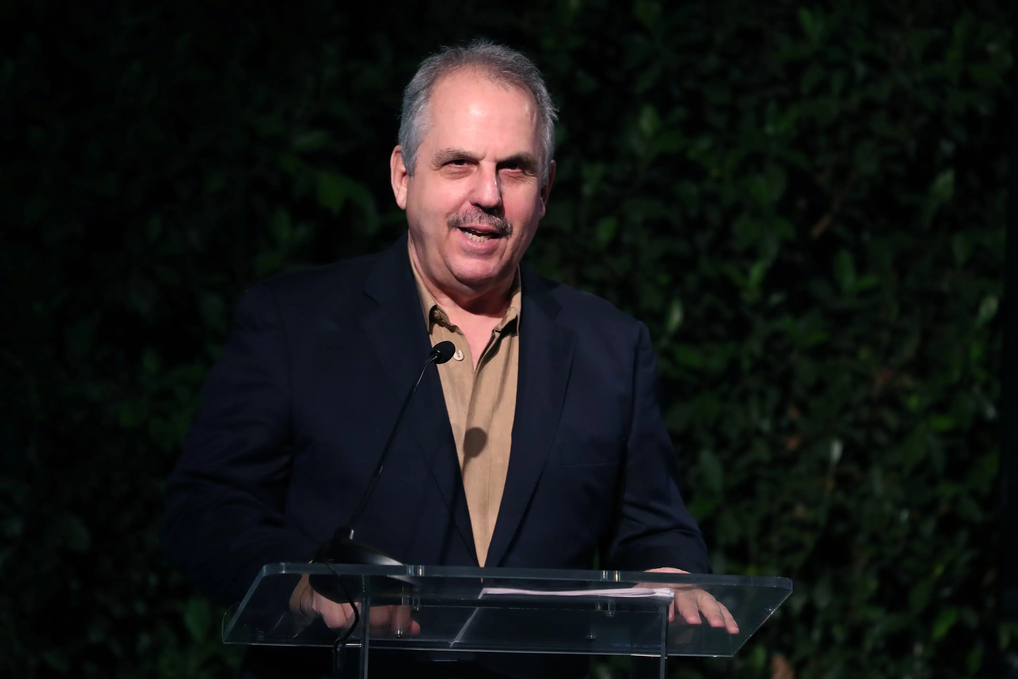 Bill Mechanic speaking on stage