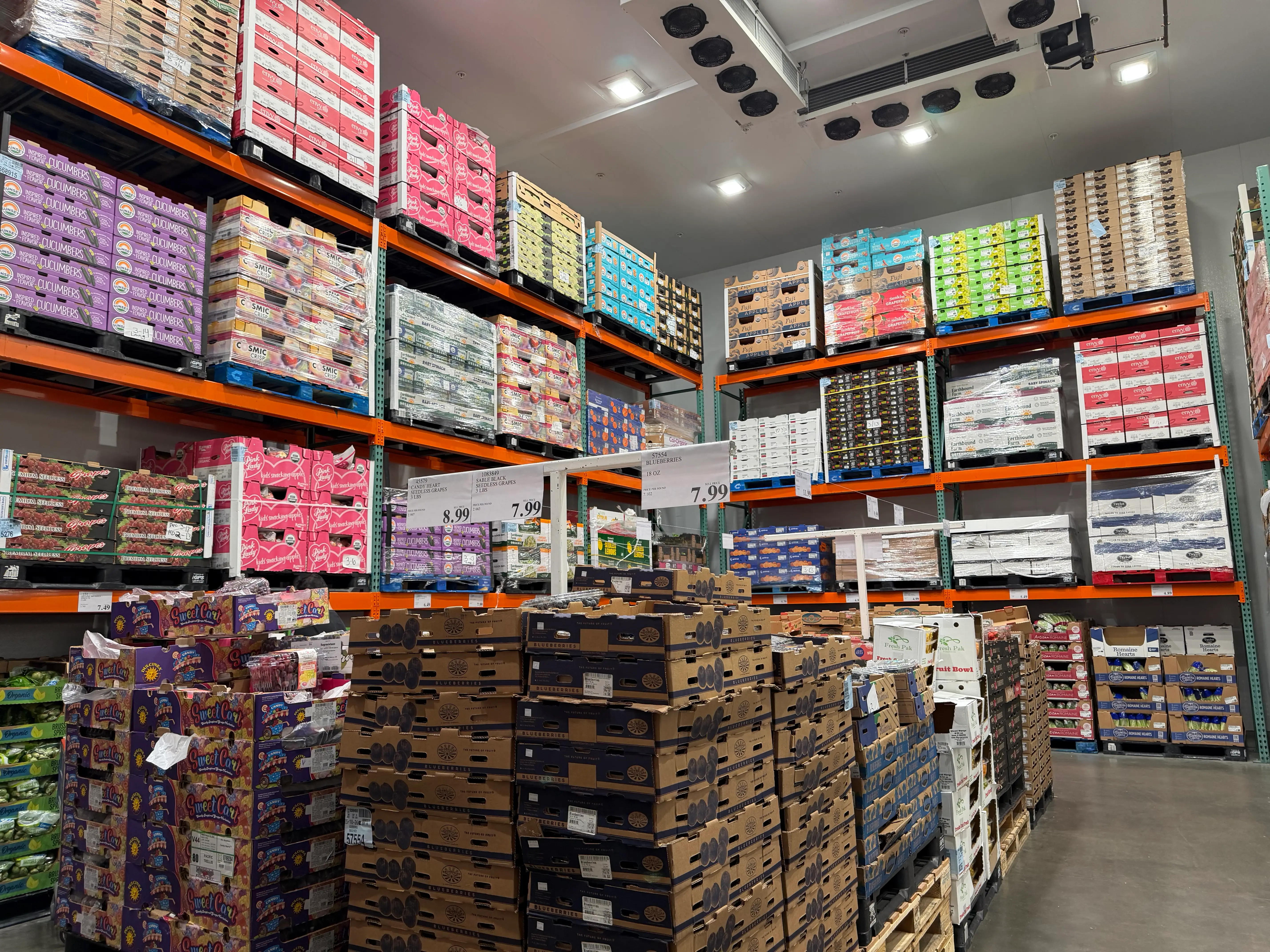 Produce section at Costco, tons of boxes stacked