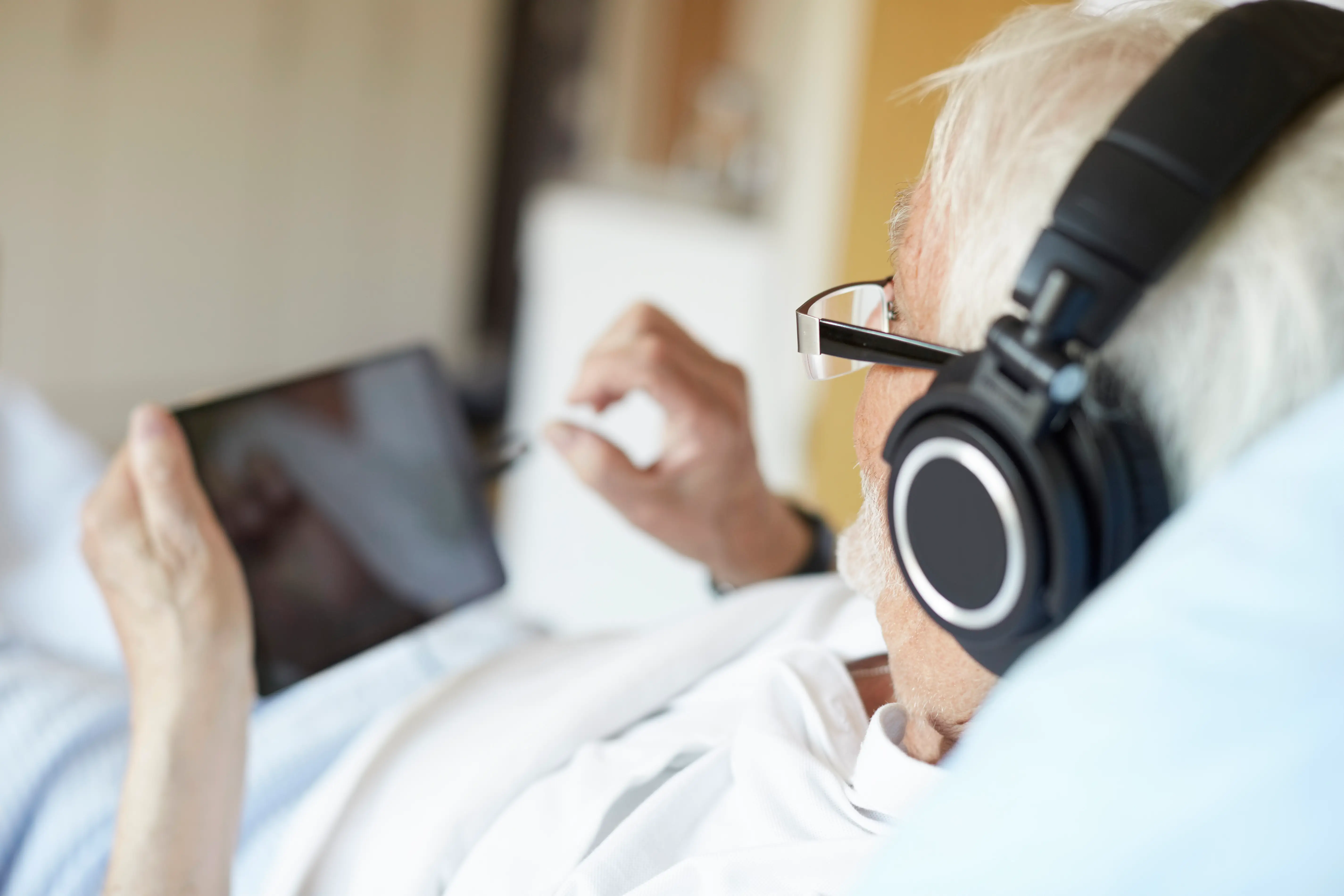 Older man using technology