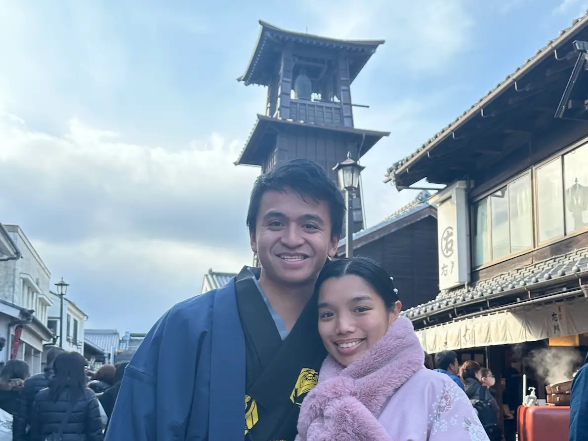Couple posing for photo in Tokyo