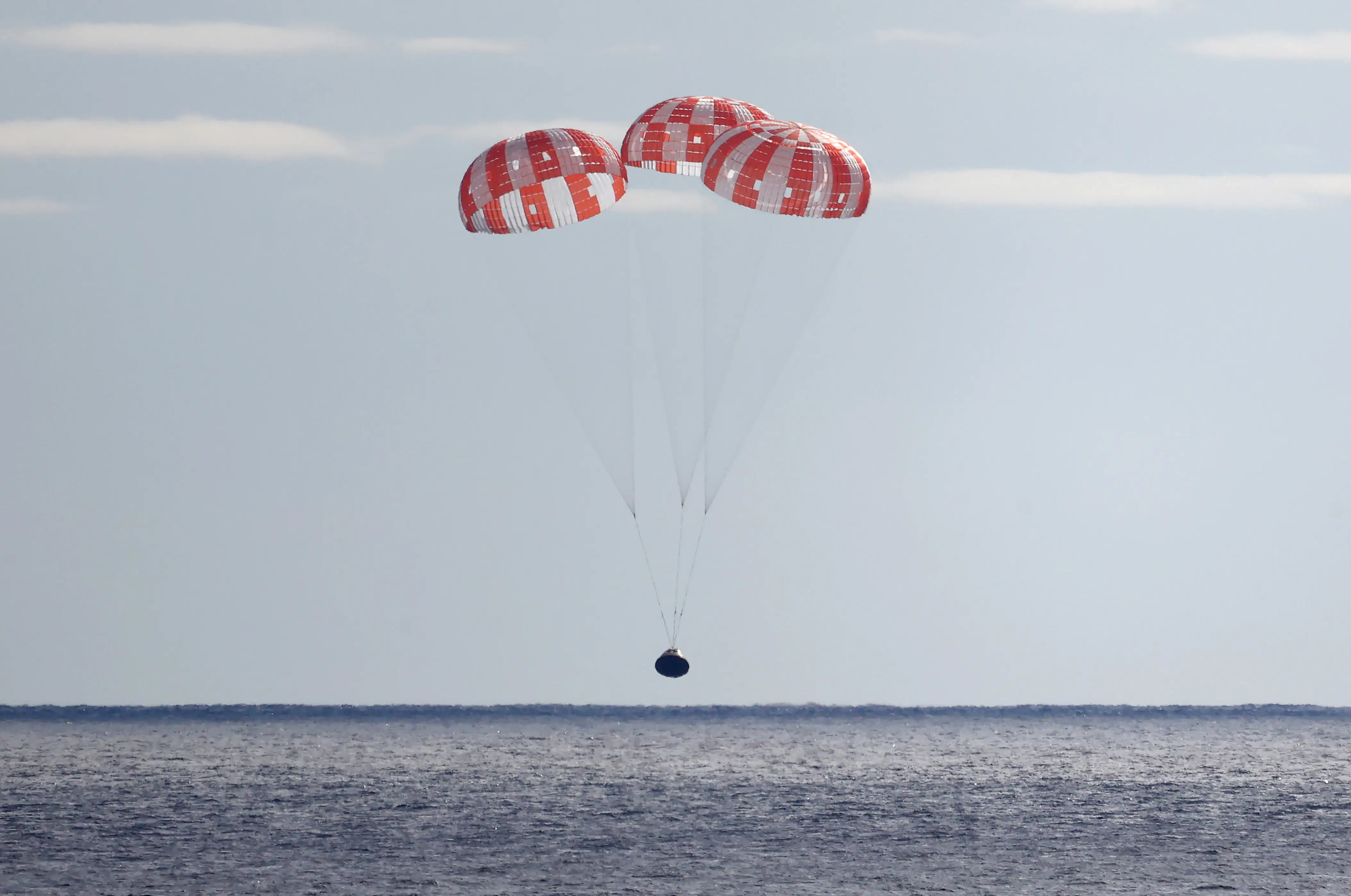 Orion capsule landing in the Pacific Ocean.