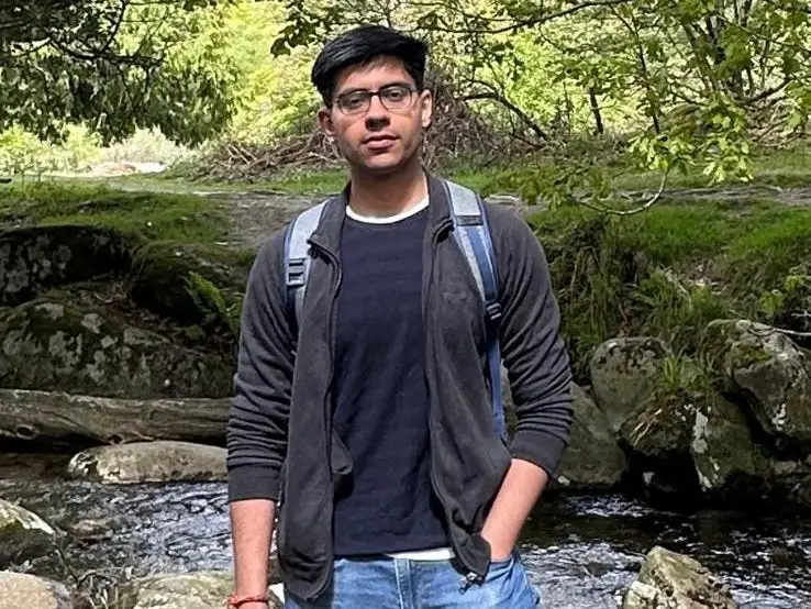 Maahir Sharma standing in forest