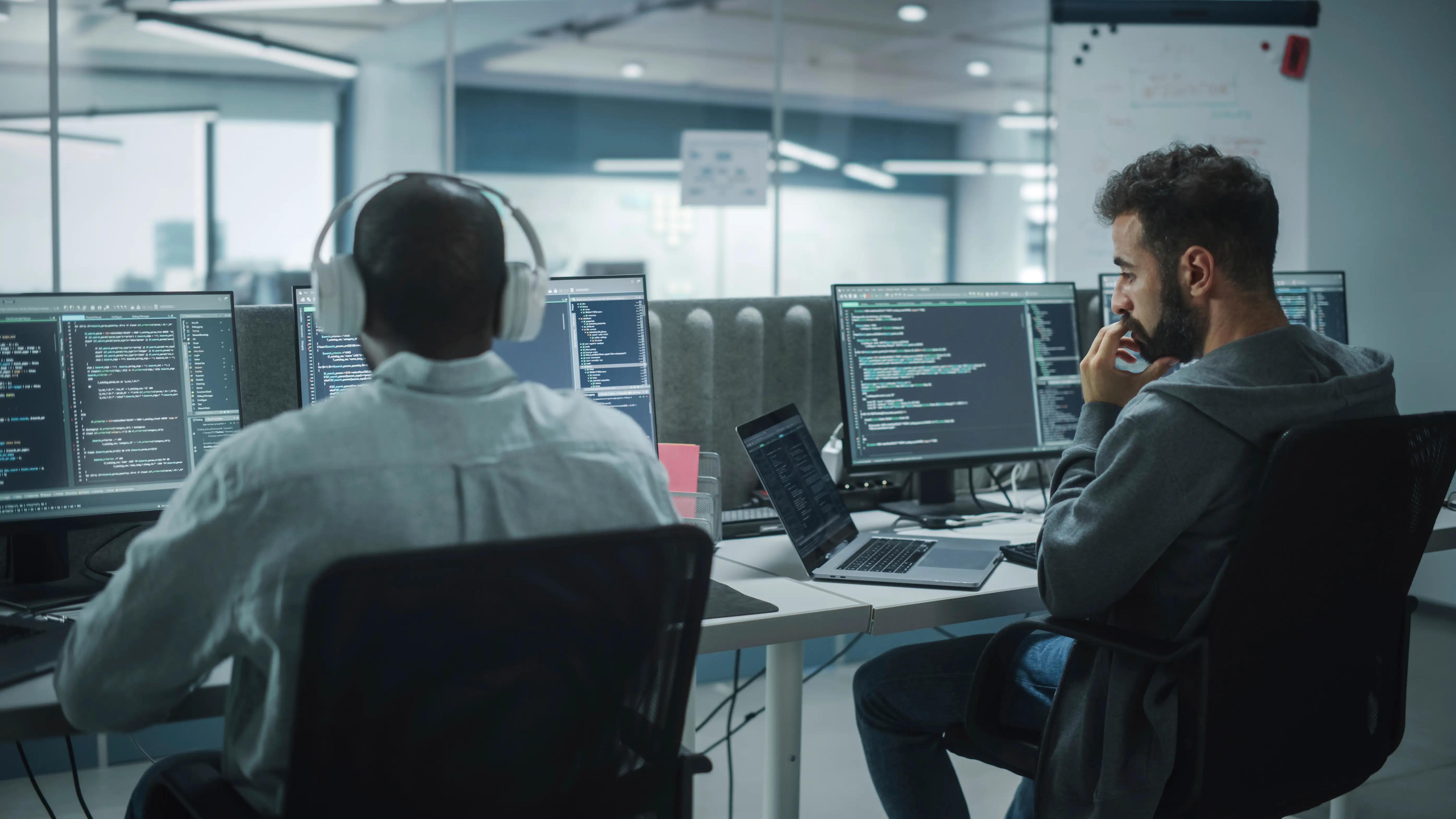 Software engineers working in an office