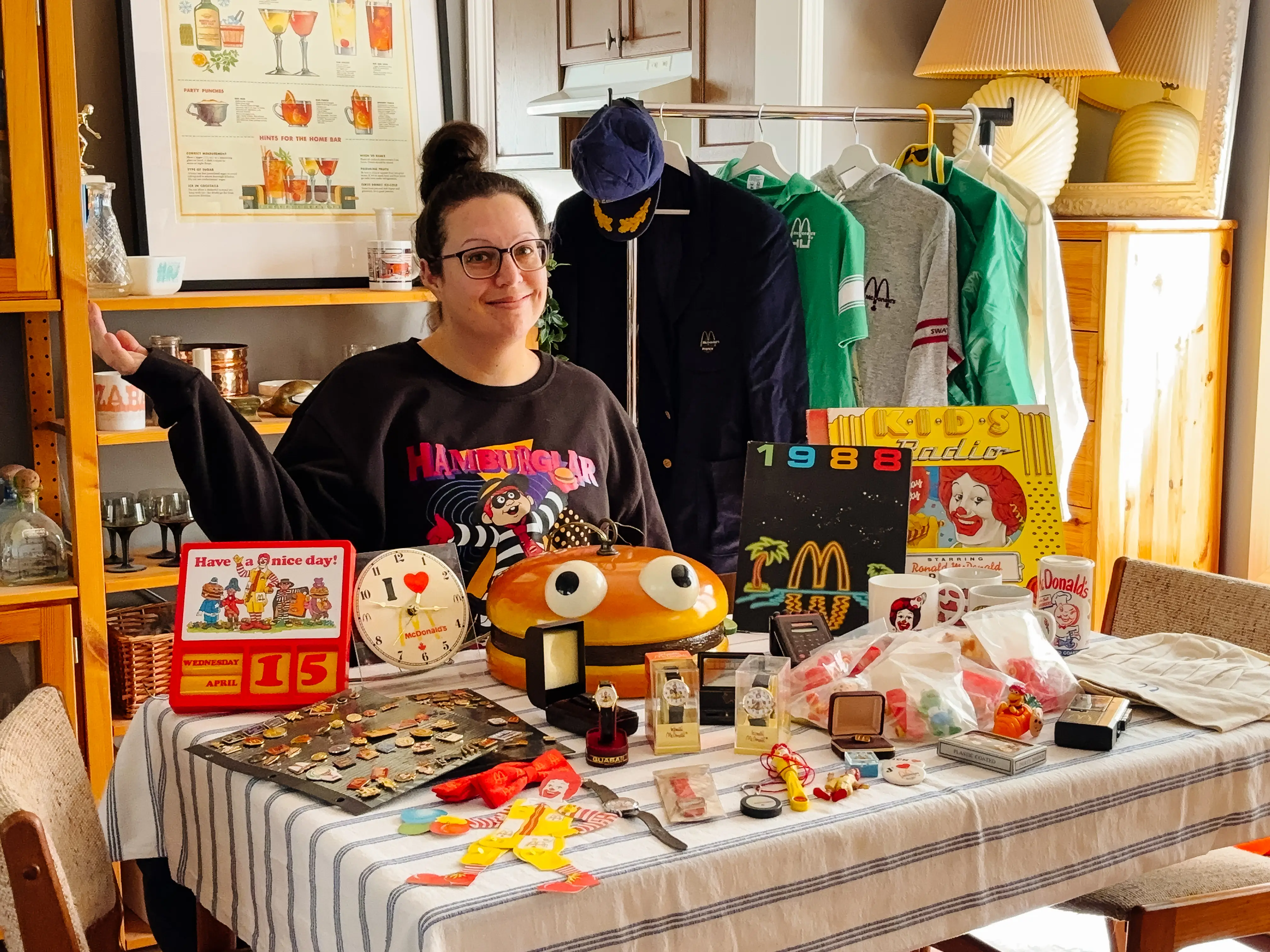 Woman posing with McDonald's memorabilia