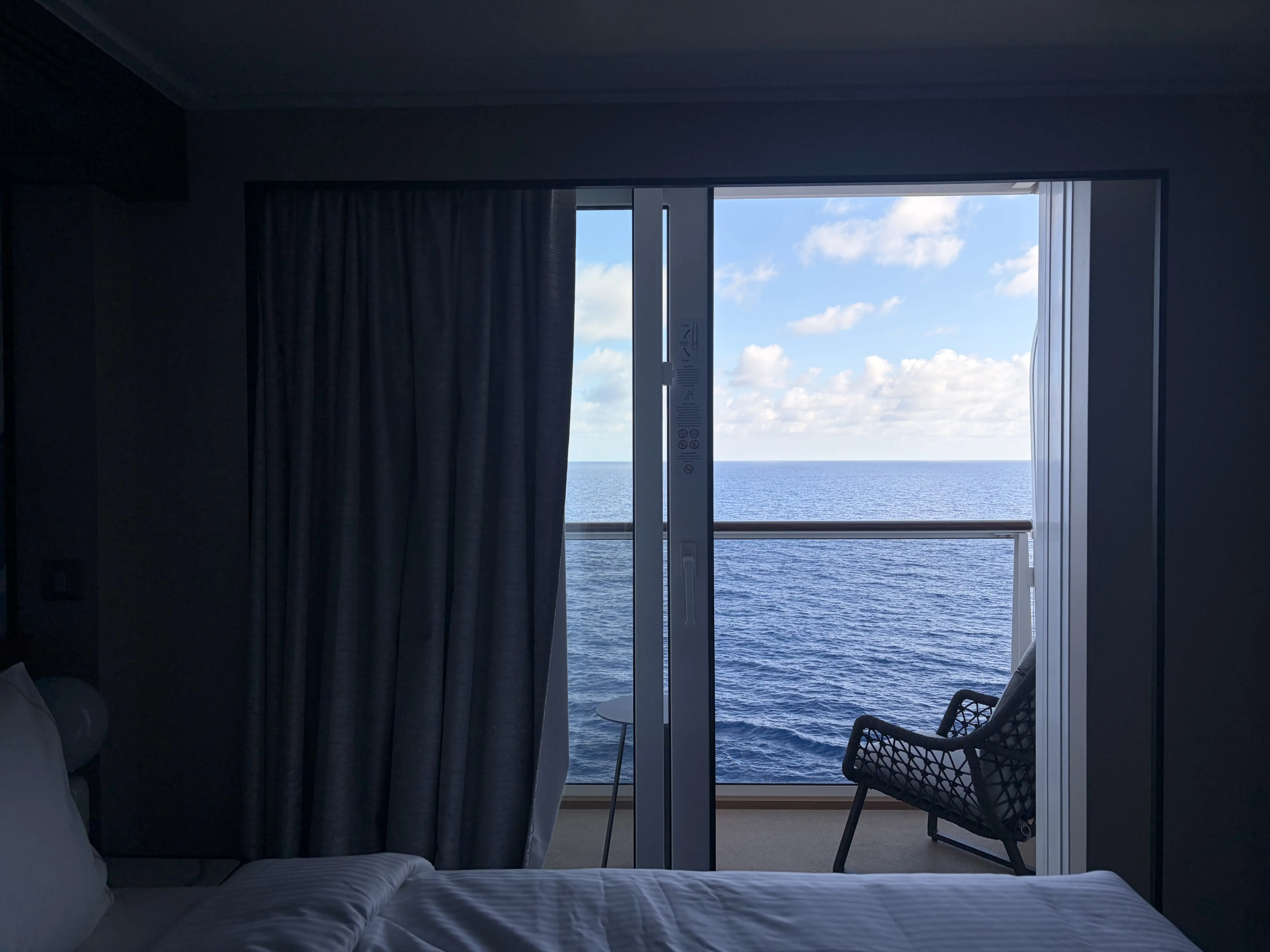 View of balcony doors in room on Norwegian Luna