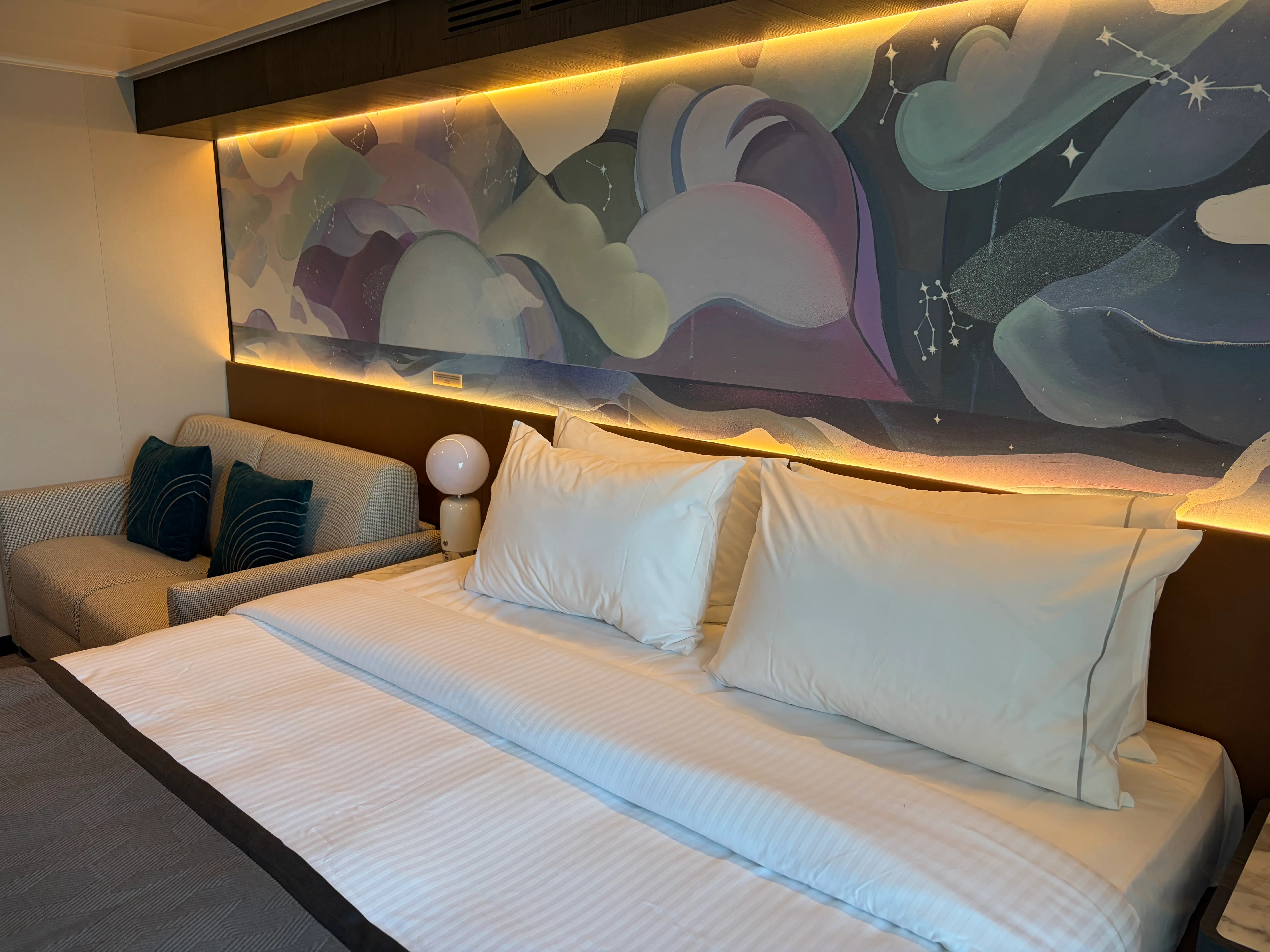 backlit headboard in room on Norwegian Luna