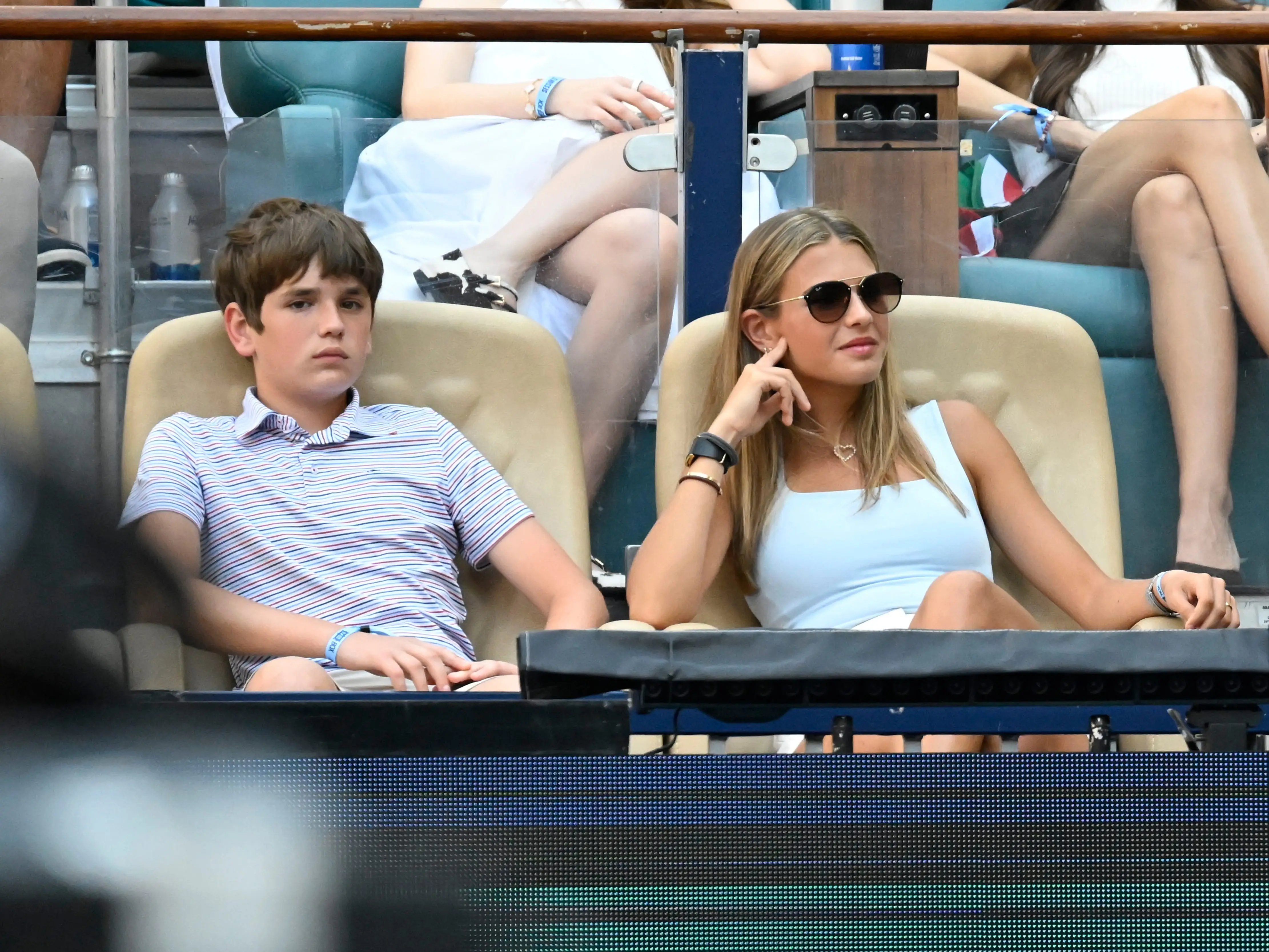 Spencer Trump , left, and Kai Trump, grandchildren of Donald Trump, the President of the United States, are seen attending the women's singles final tennis match of the Miami Open on March 28, 2026,