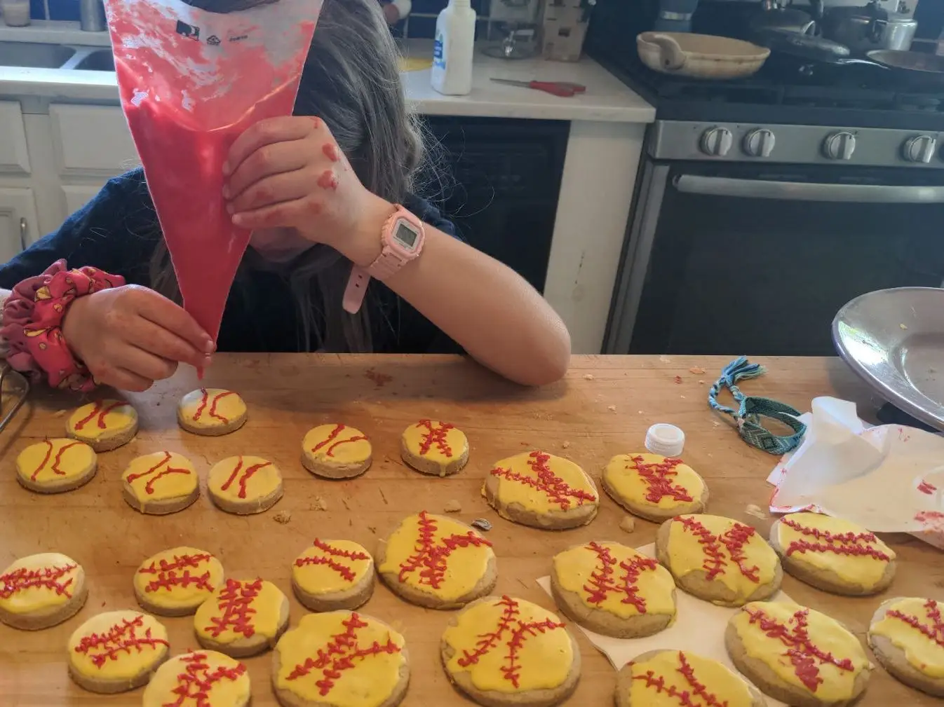 Michaeleen Doucleff's daughter decorating cookies