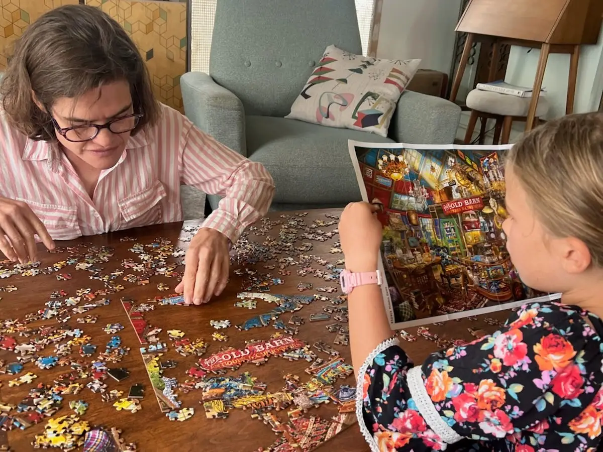 Doucleff doing a puzzle with her daughter