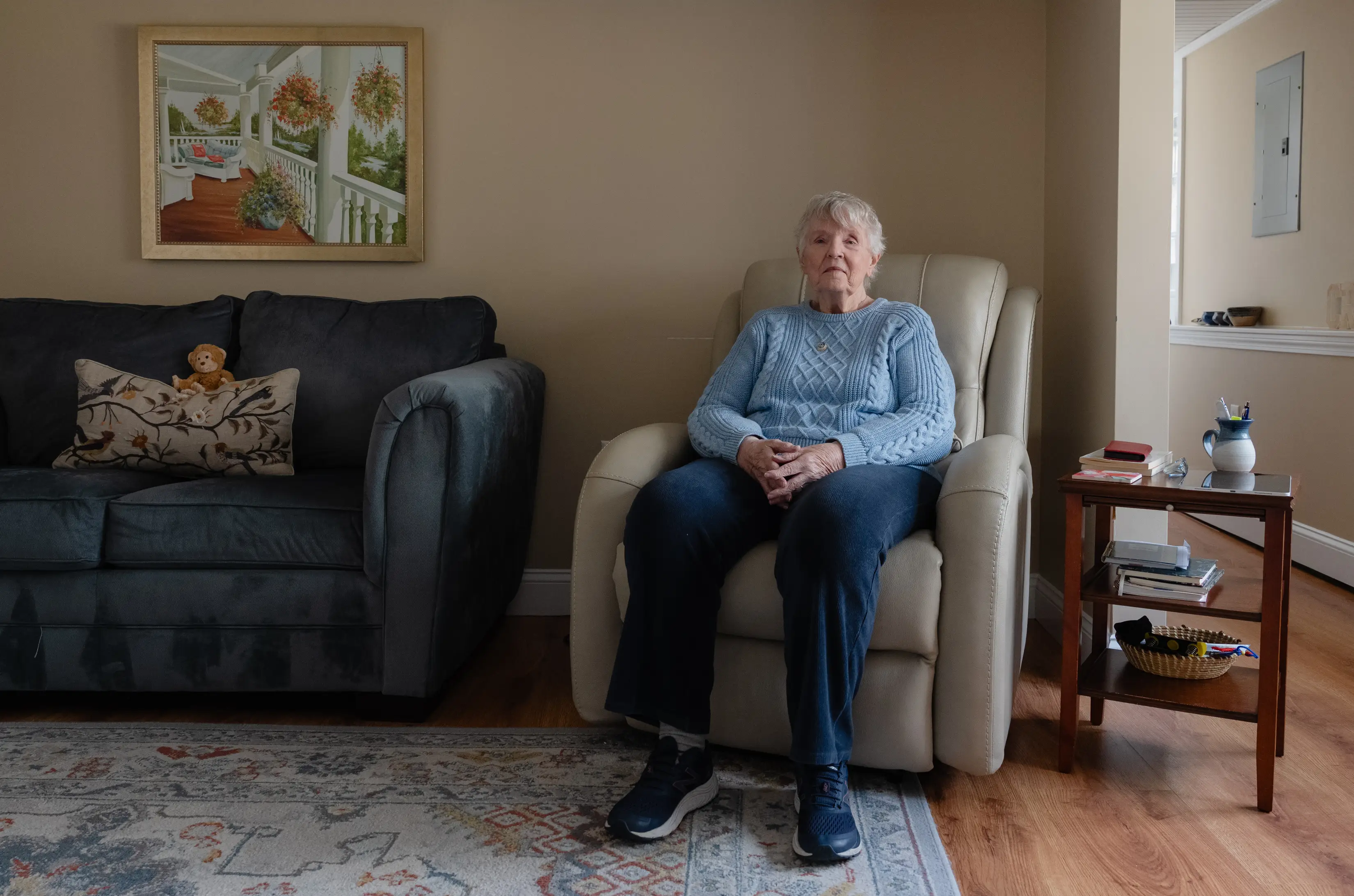 Juli Ford's mother sitting on a recliner