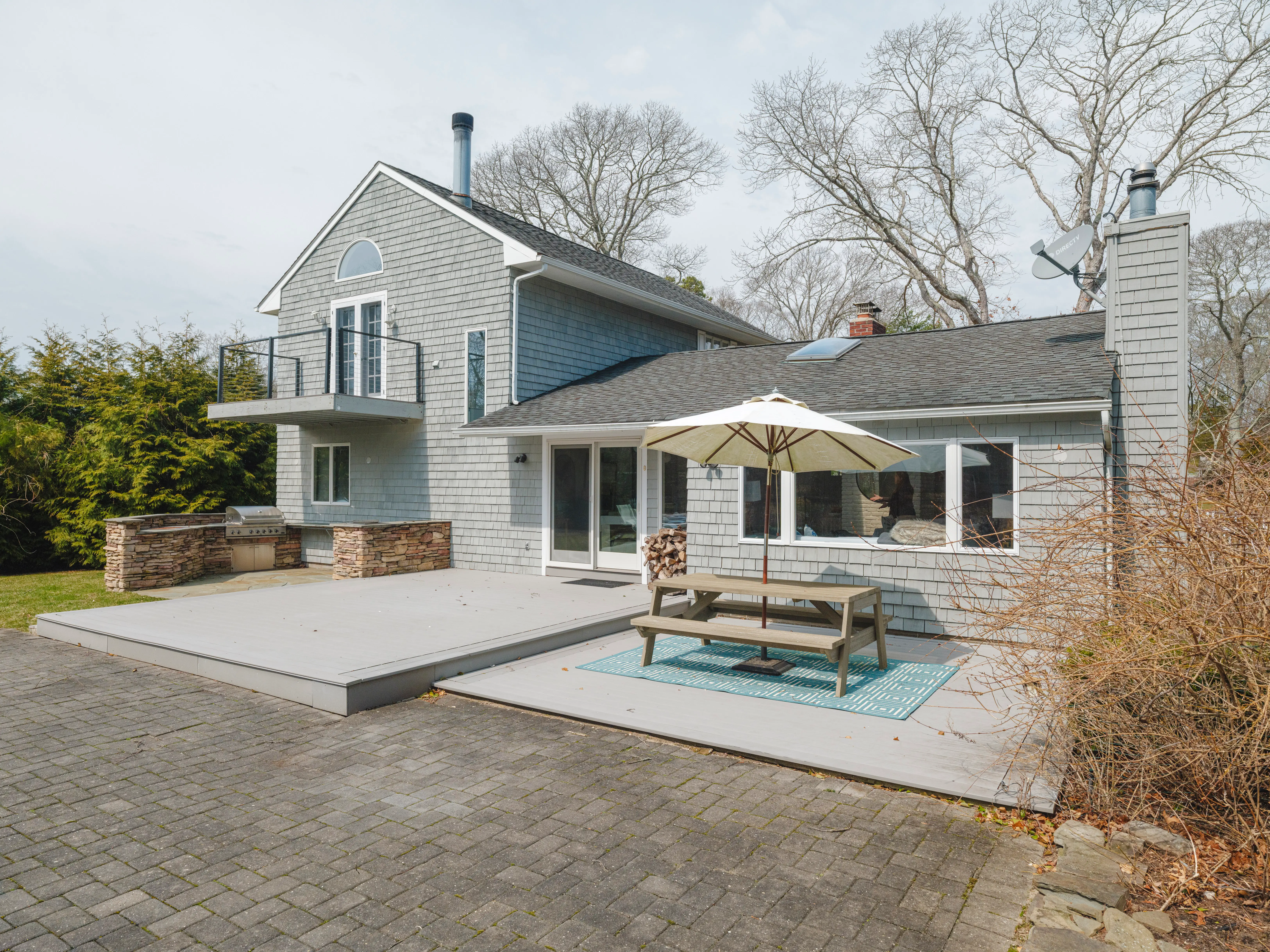 exterior of Vanessa Gordon's home with the backayrd in view