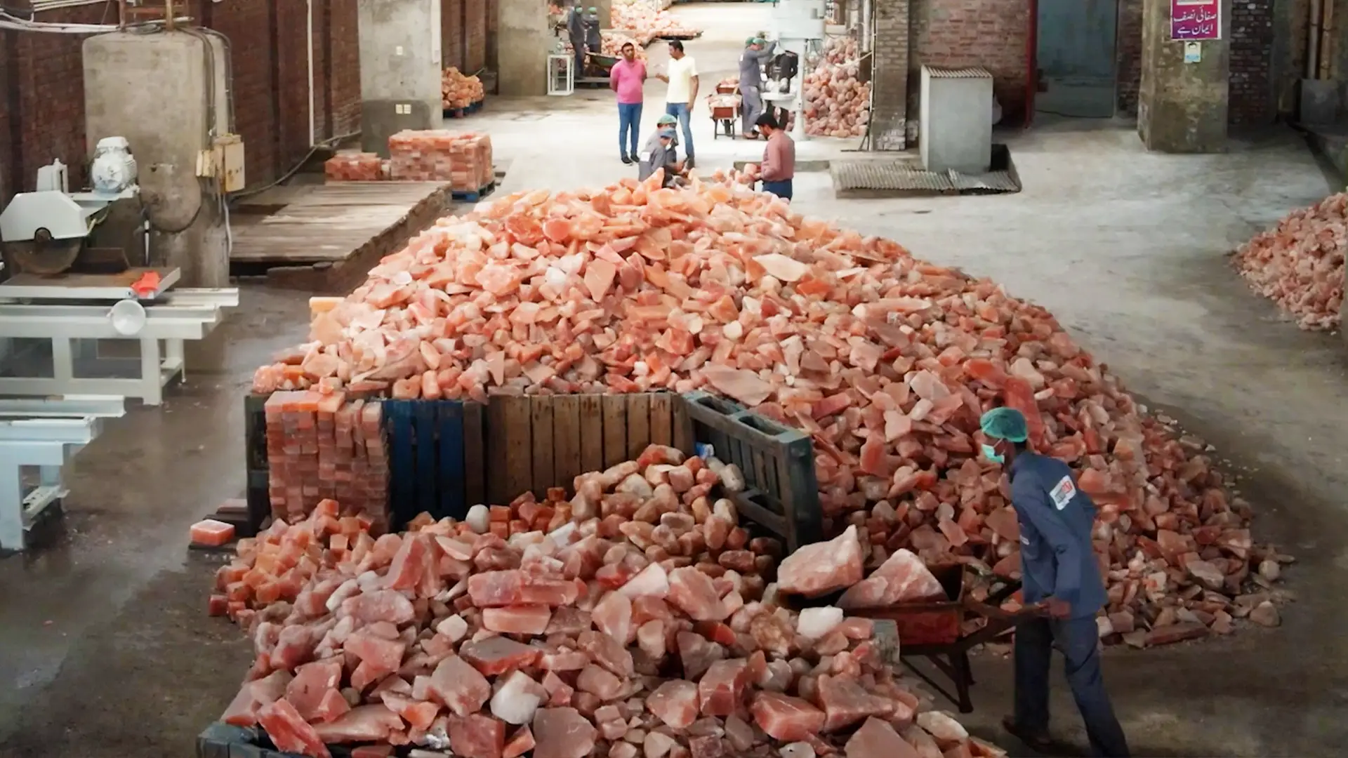 Pile of pink salt blocks ready for processing.